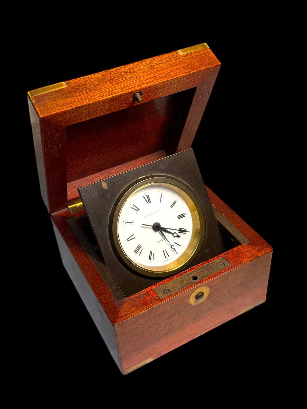 A Tiffany & Co. Swiss Brass Mounted Mahogany Cased Desk Timepiece