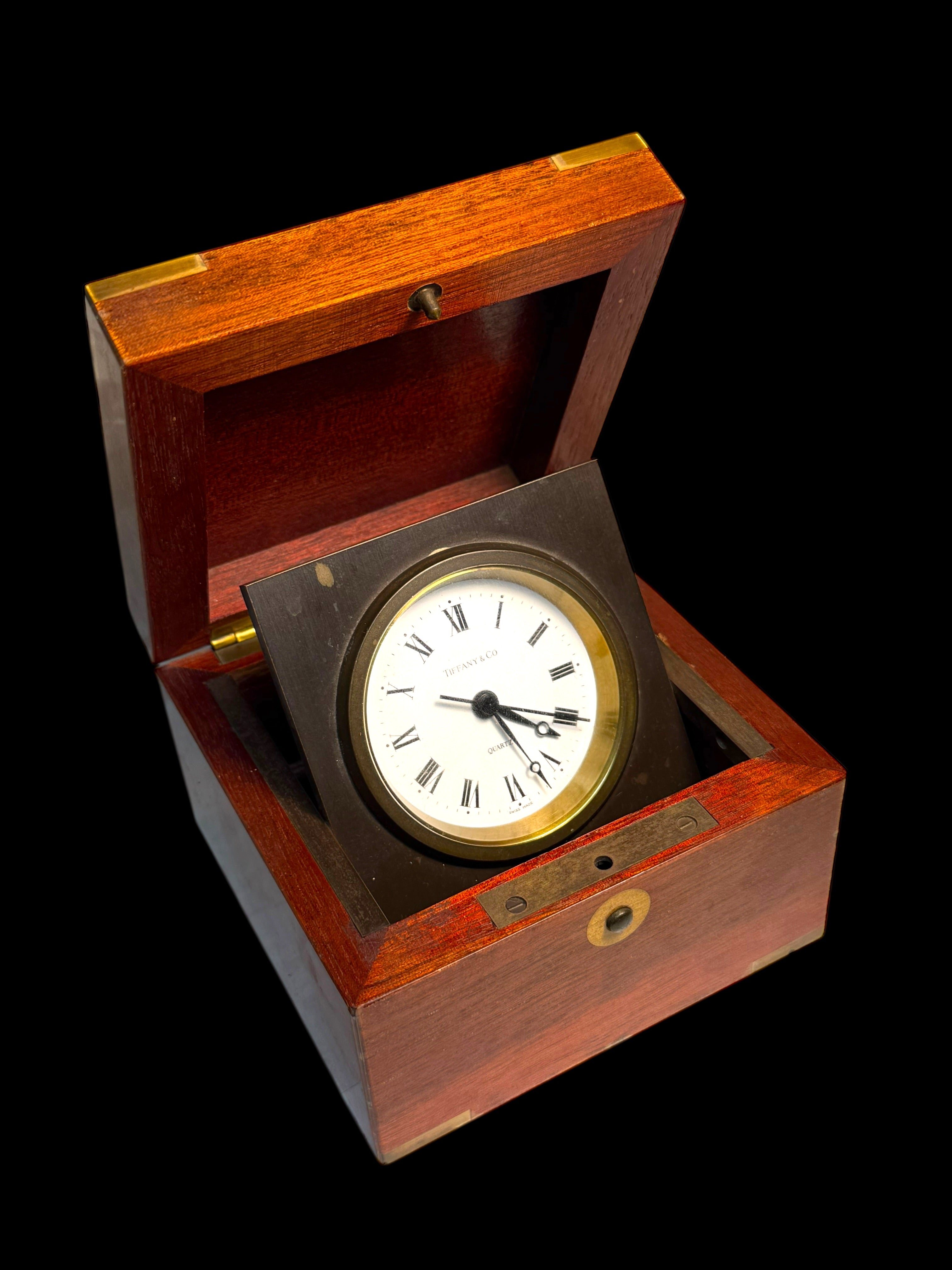 A Tiffany & Co. Swiss Brass Mounted Mahogany Cased Desk Timepiece