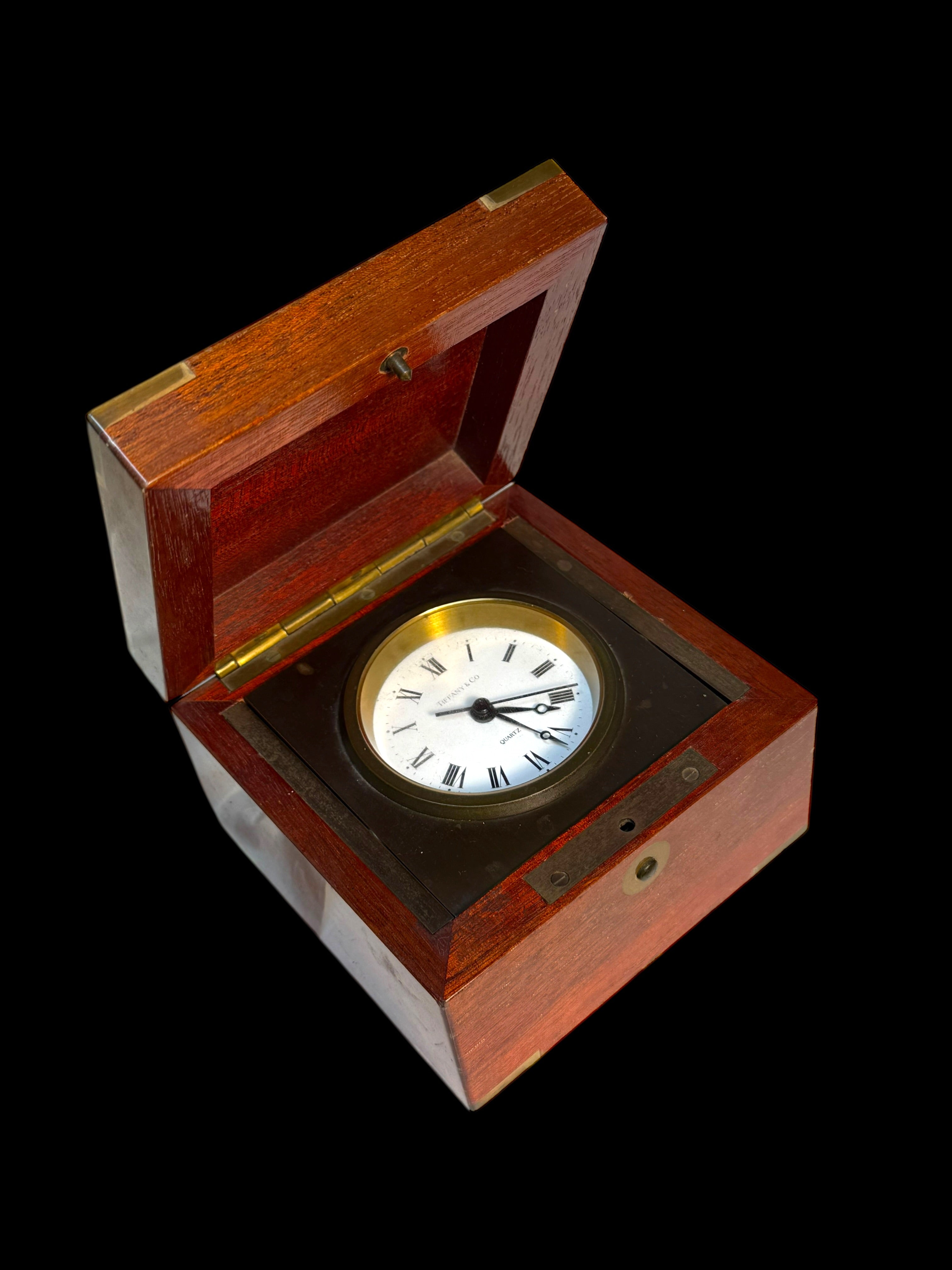 A Tiffany & Co. Swiss Brass Mounted Mahogany Cased Desk Timepiece
