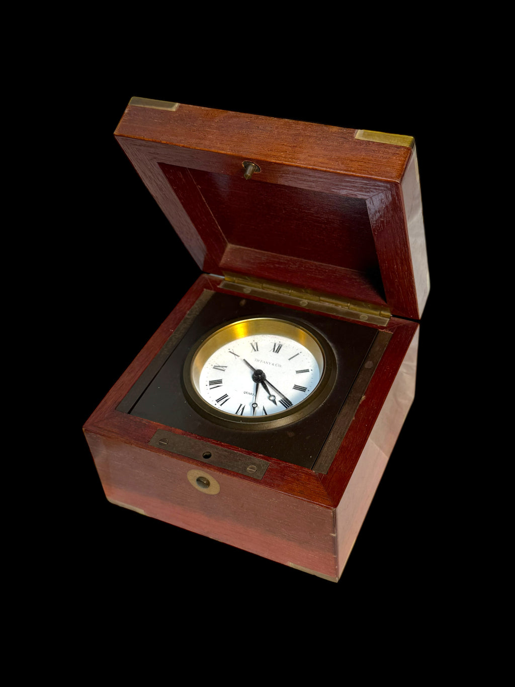 A Tiffany & Co. Swiss Brass Mounted Mahogany Cased Desk Timepiece