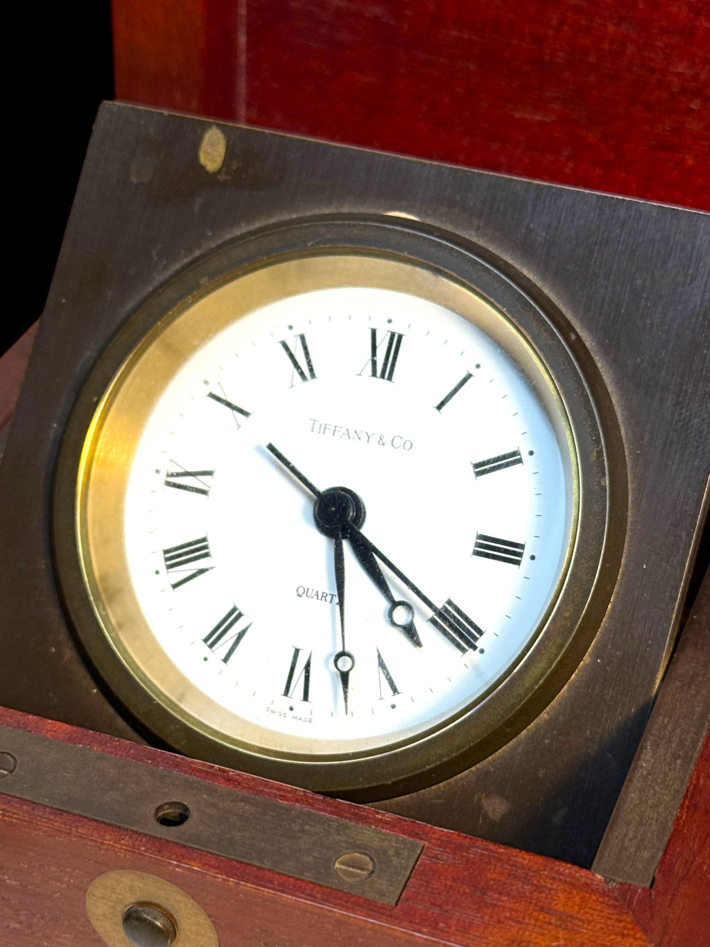 A Tiffany & Co. Swiss Brass Mounted Mahogany Cased Desk Timepiece