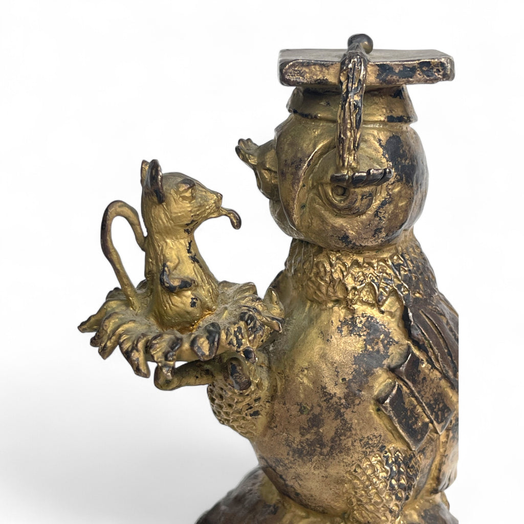 A Gilt Bronze Sculpture of an Owl Holding a Mouse