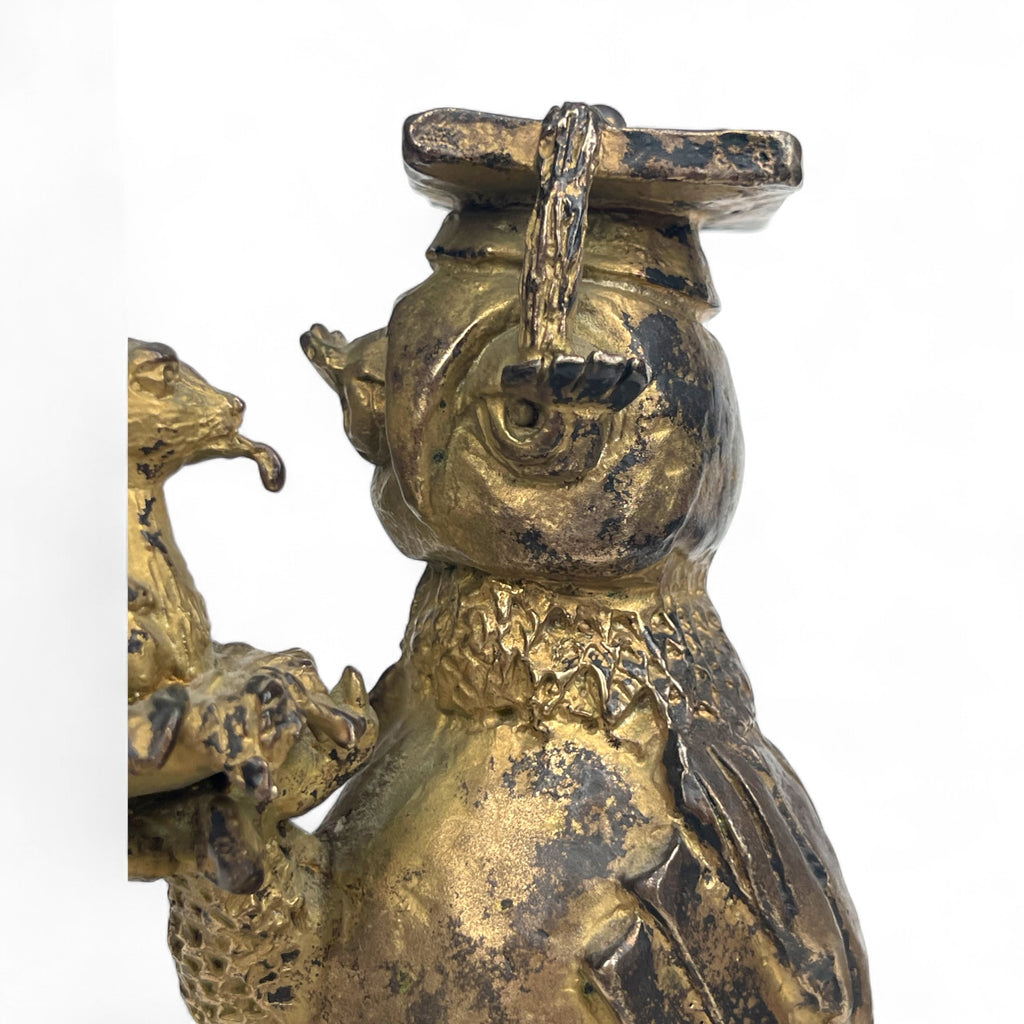 A Gilt Bronze Sculpture of an Owl Holding a Mouse