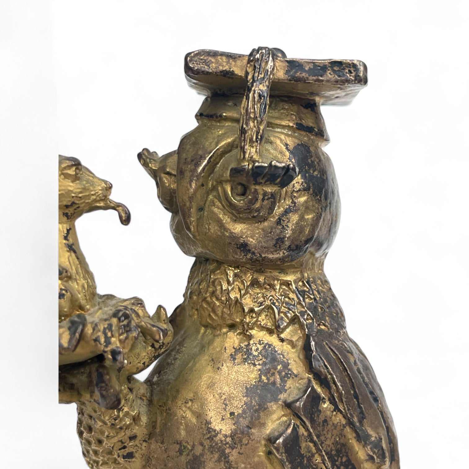 A Gilt Bronze Sculpture of an Owl Holding a Mouse