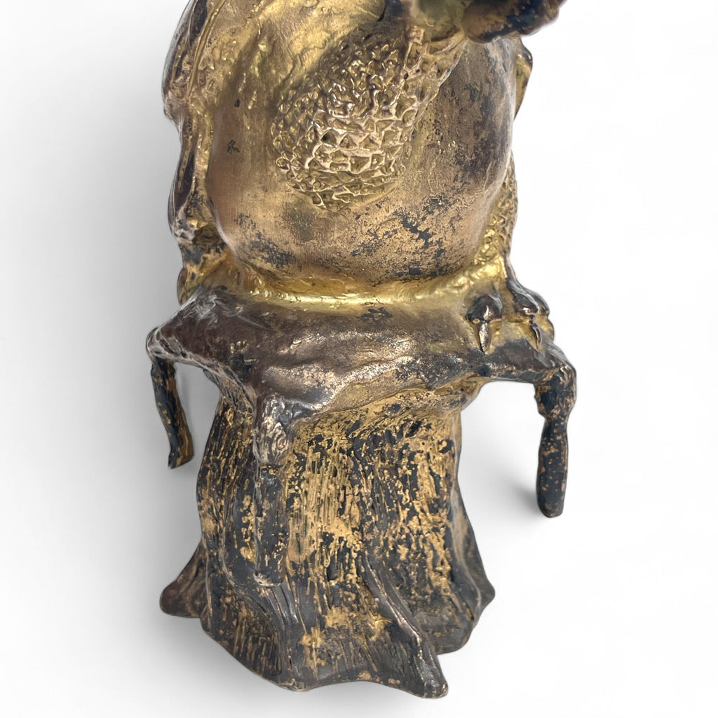 A Gilt Bronze Sculpture of an Owl Holding a Mouse