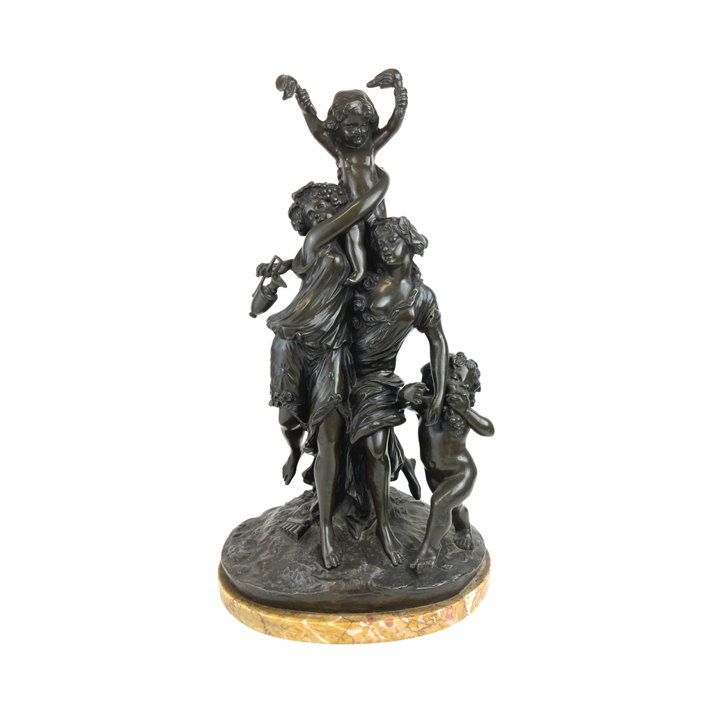 A Patinated Bronze Group Mounted Marble Base