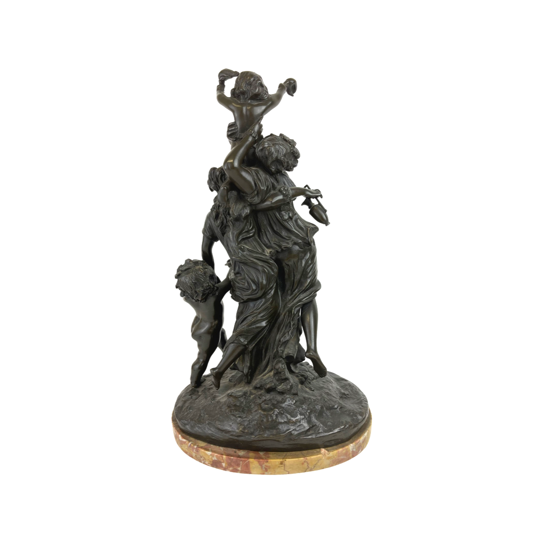 A Patinated Bronze Group Mounted Marble Base