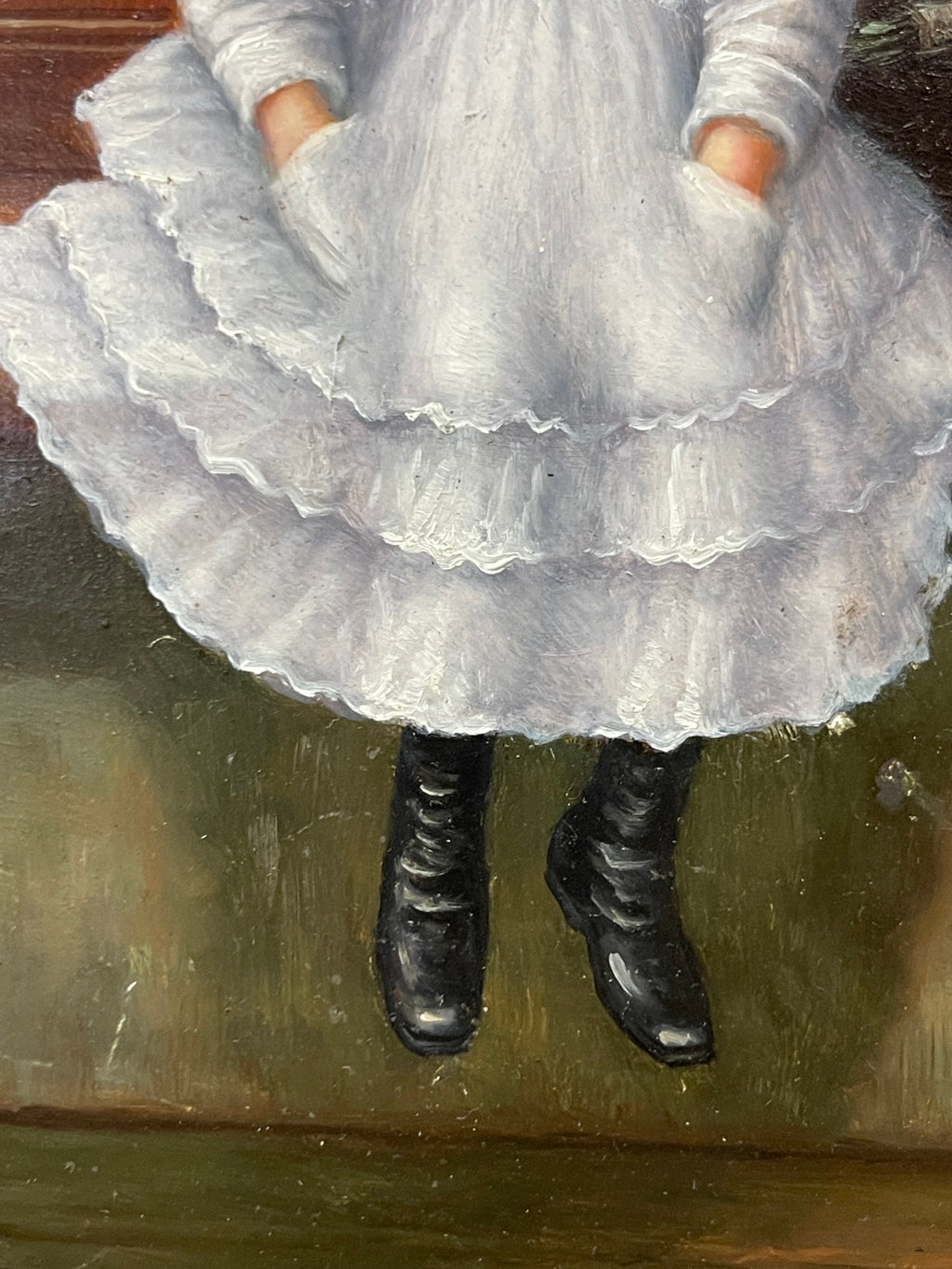 An Oil on Board Painting Depicting a Seated Young Girl at a Train Station