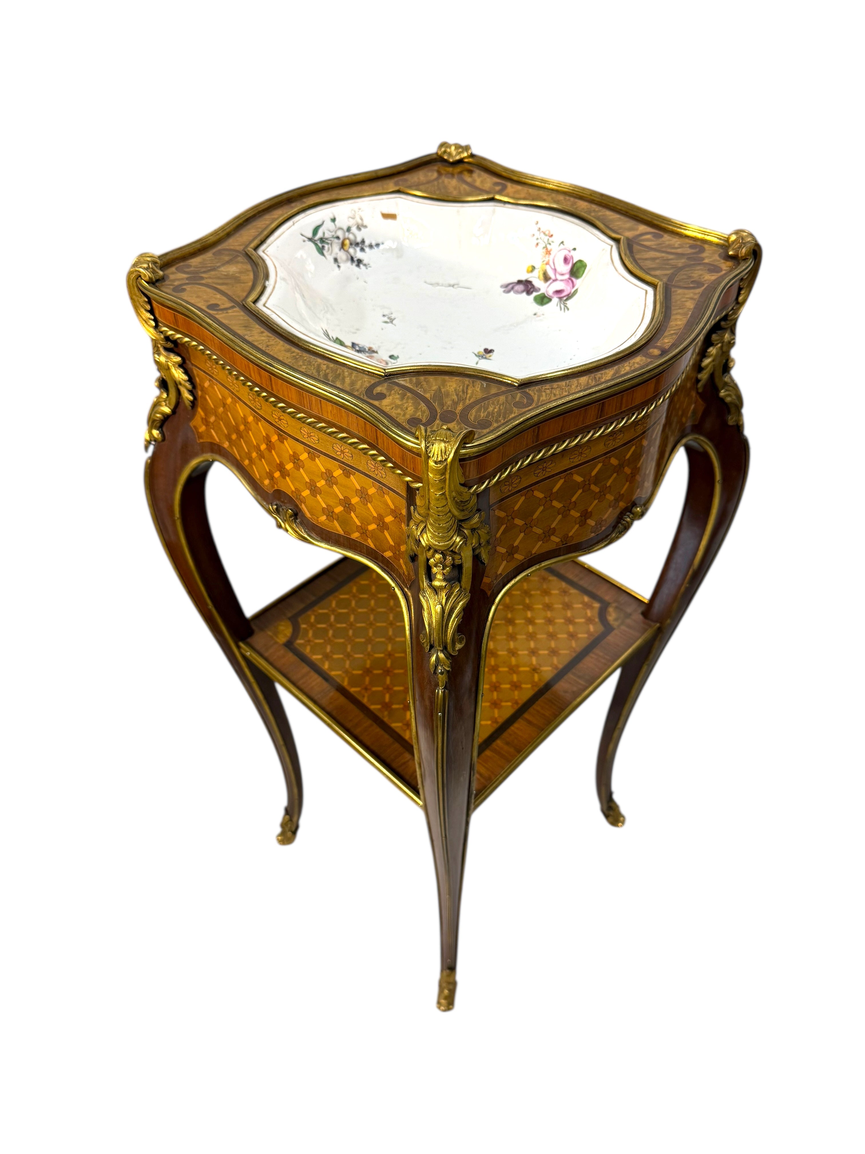 An Ormolu & Sevres Porcelain Mounted Table By Henry Dasson