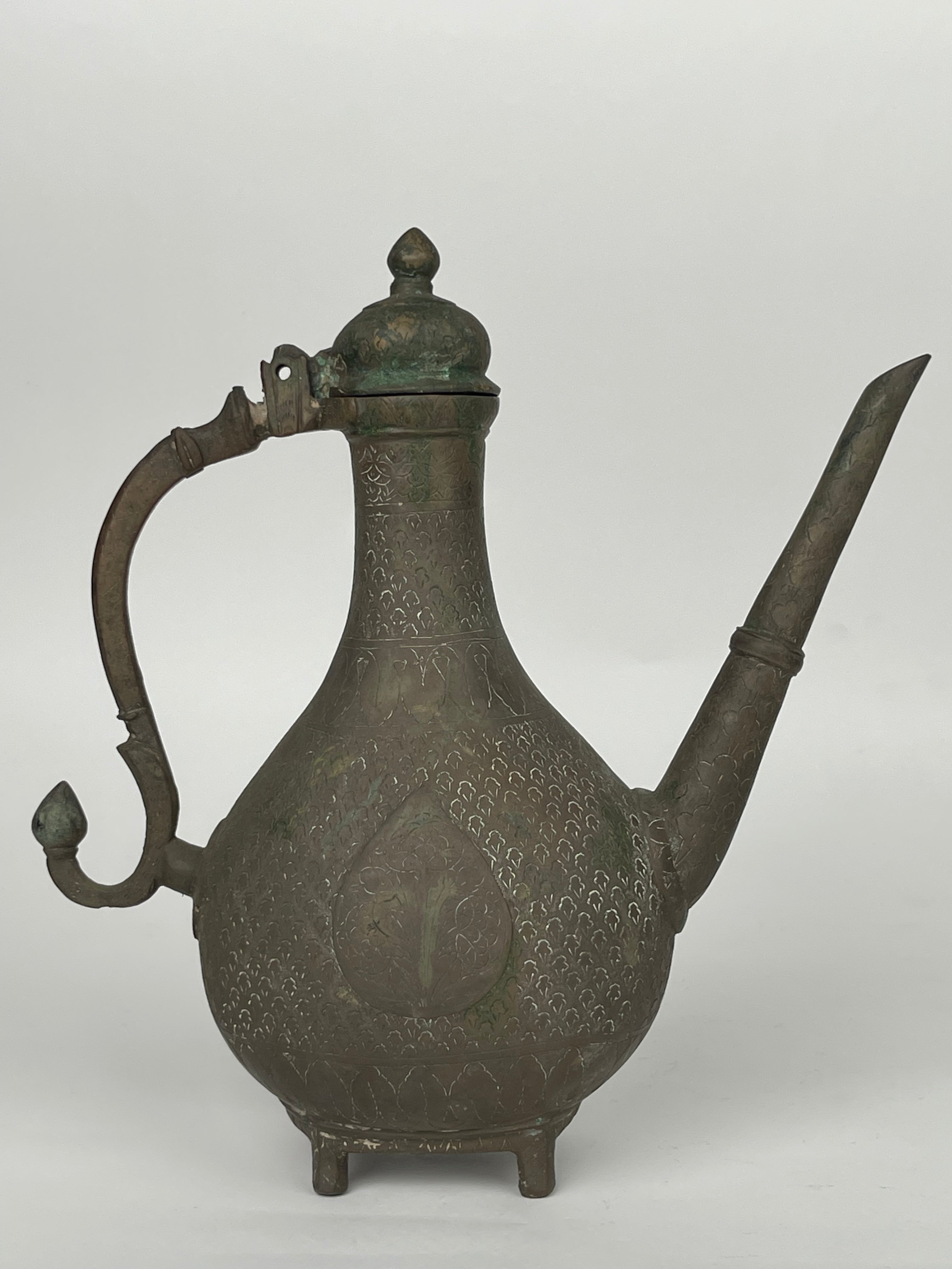 A Persian Hand Engraved Brass Pitcher