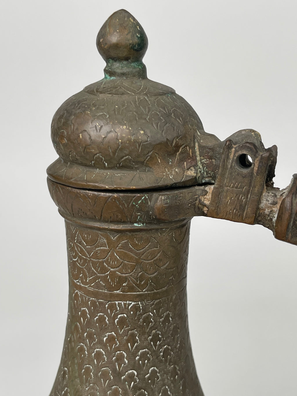 A Persian Hand Engraved Brass Pitcher