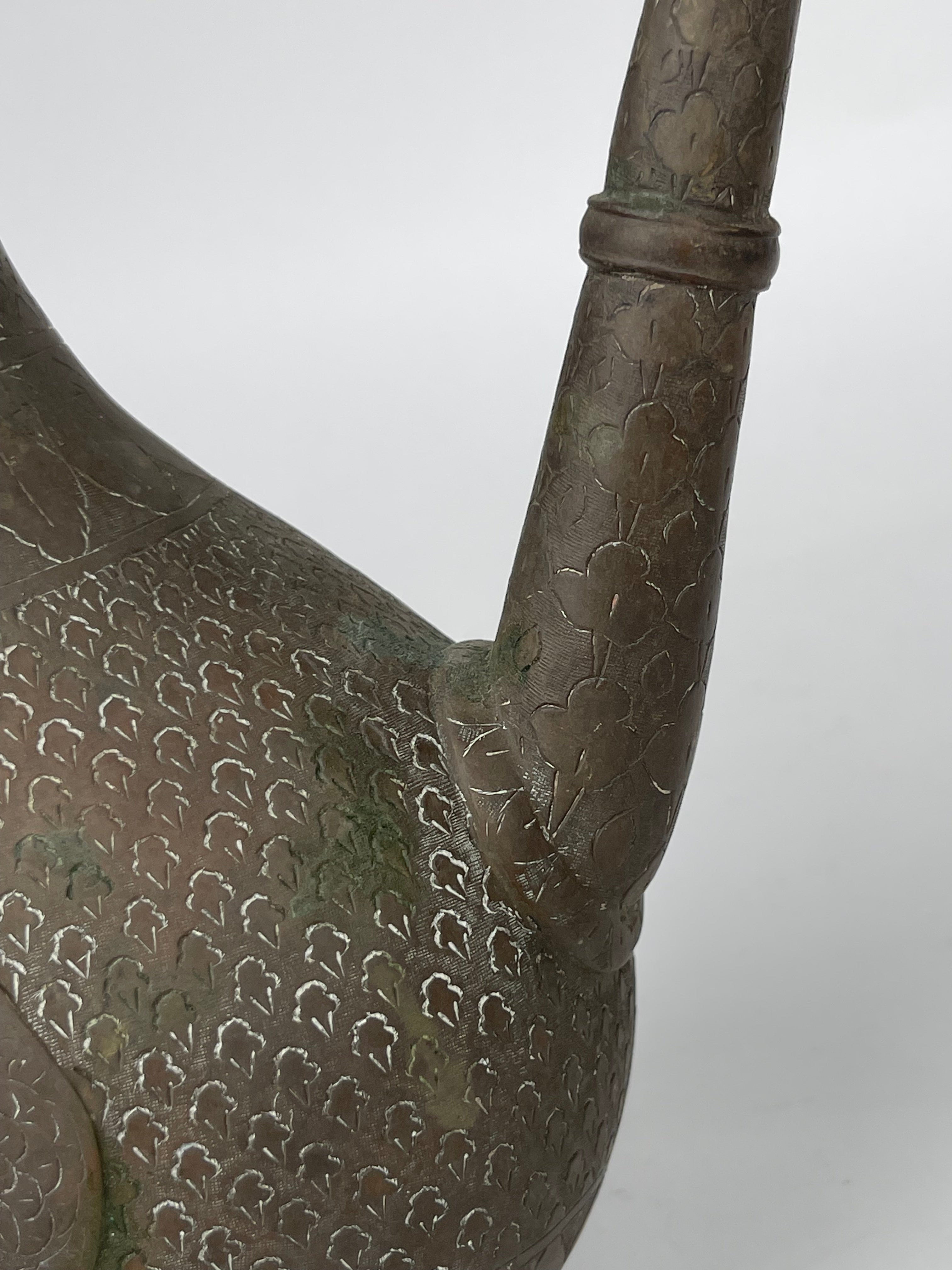 A Persian Hand Engraved Brass Pitcher