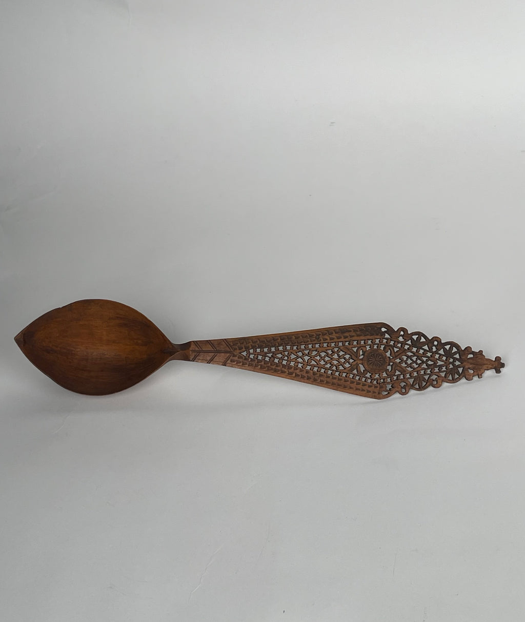 A Persian Qajar Hand Carved Wooden Sherbet Spoon.  Circa 1880
