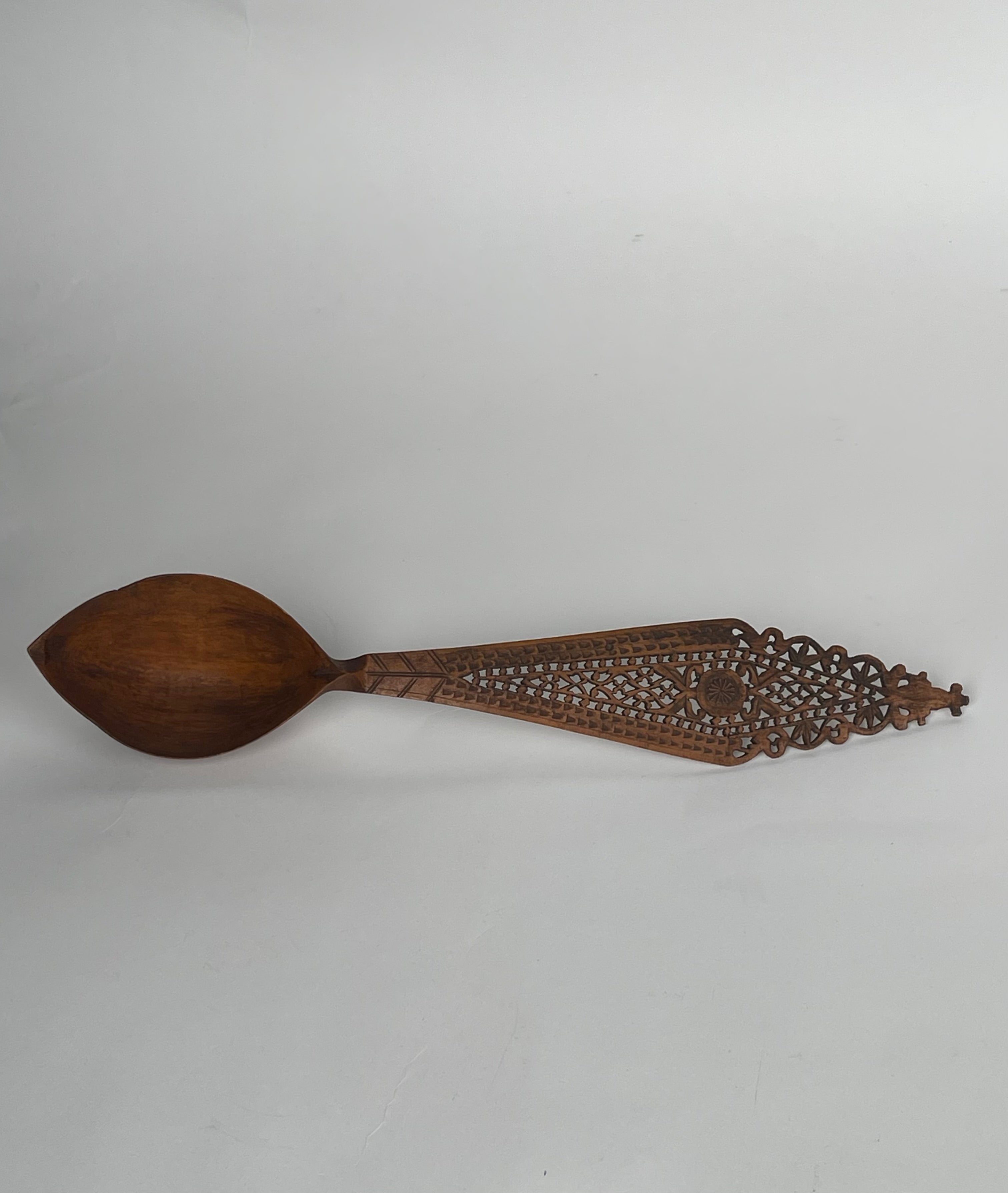 A Persian Qajar Hand Carved Wooden Sherbet Spoon.  Circa 1880