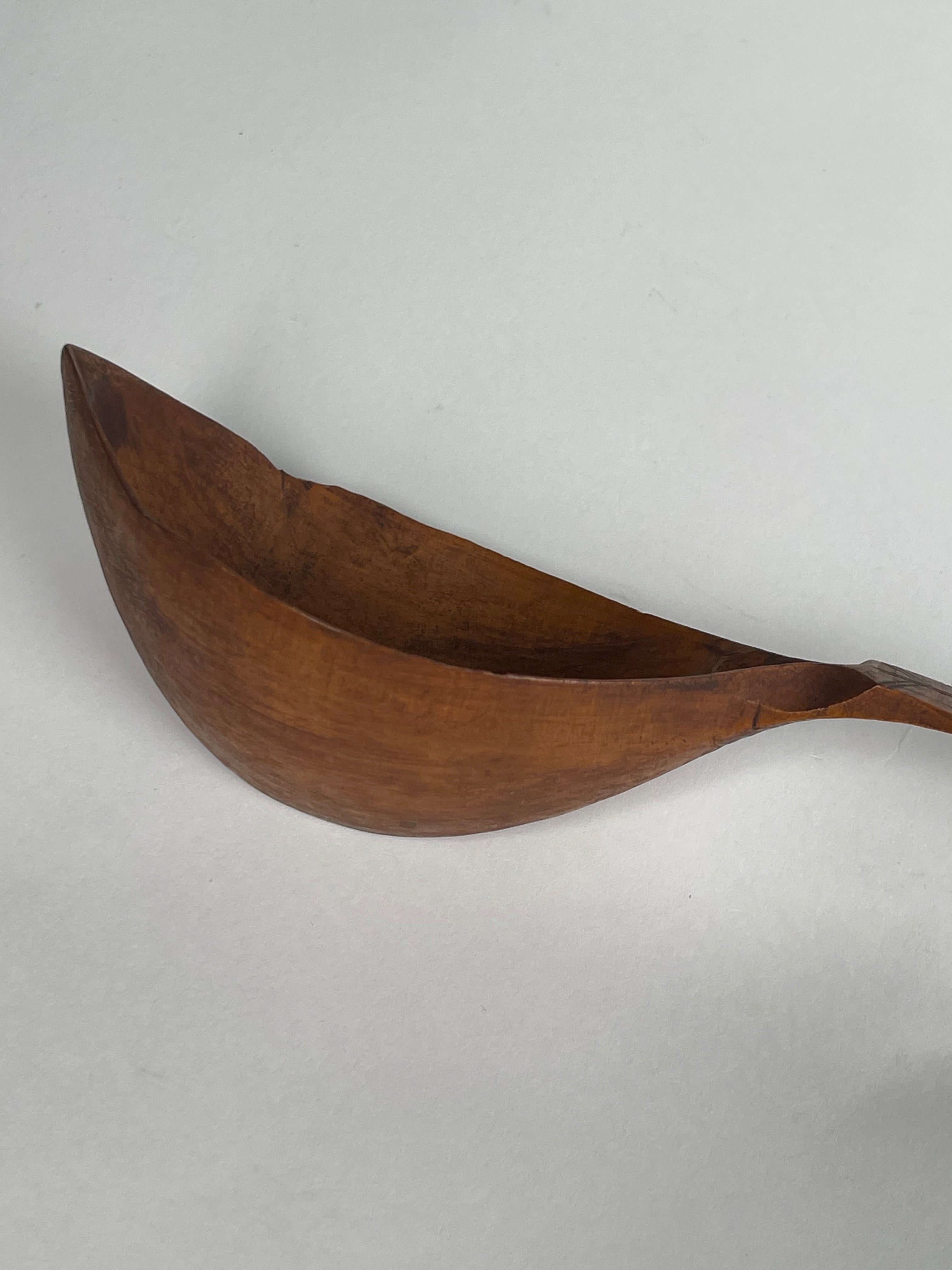 A Persian Qajar Hand Carved Wooden Sherbet Spoon.  Circa 1880