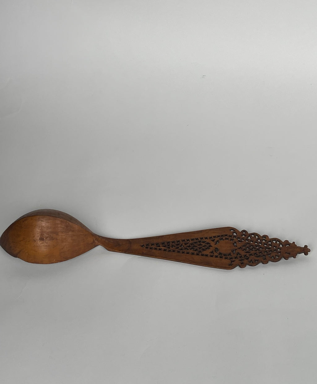 A Persian Qajar Hand Carved Wooden Sherbet Spoon.  Circa 1880