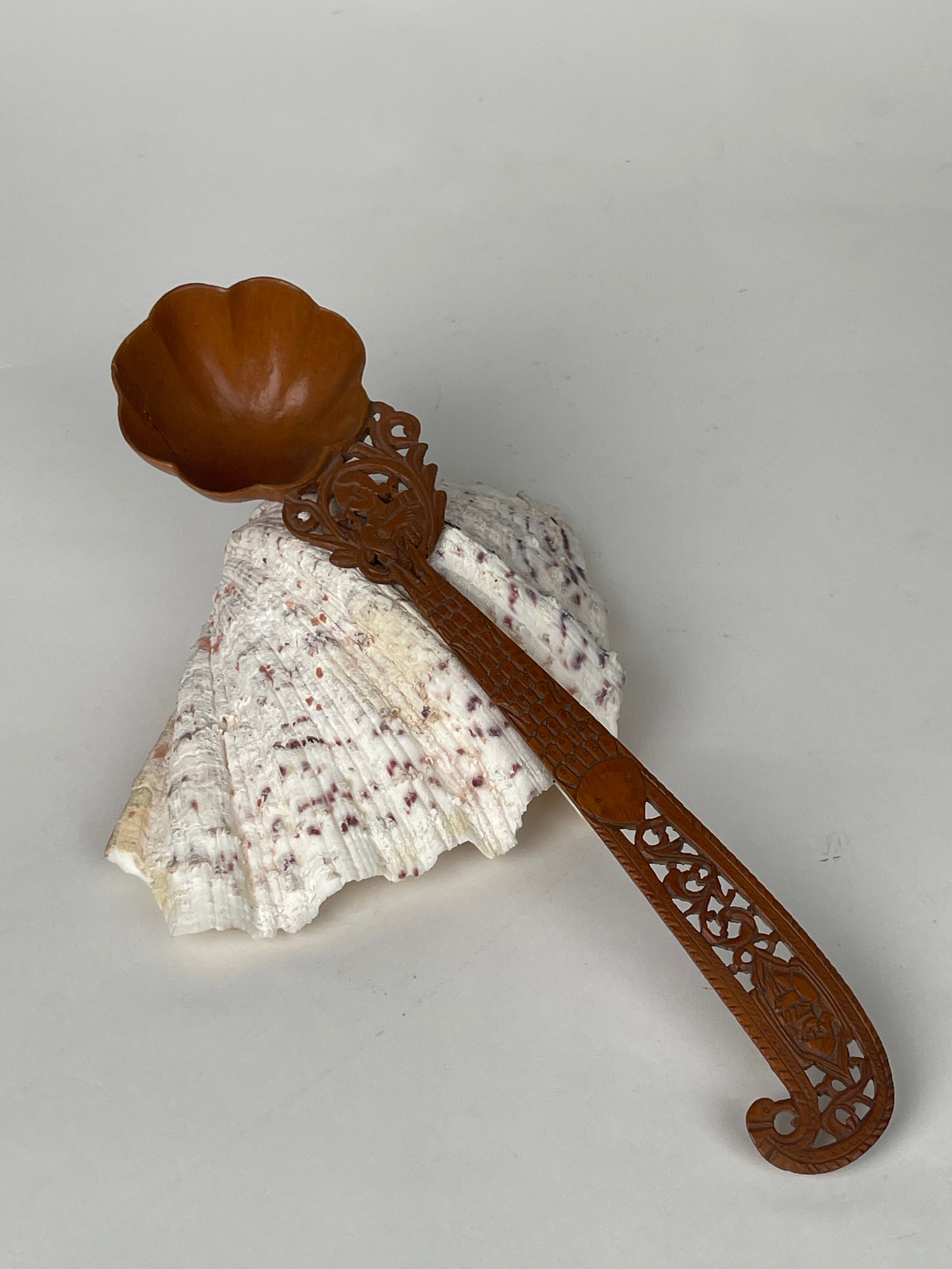 A Persian Qajar Hand Carved Wooden Sherbet Spoon. Circa 1880