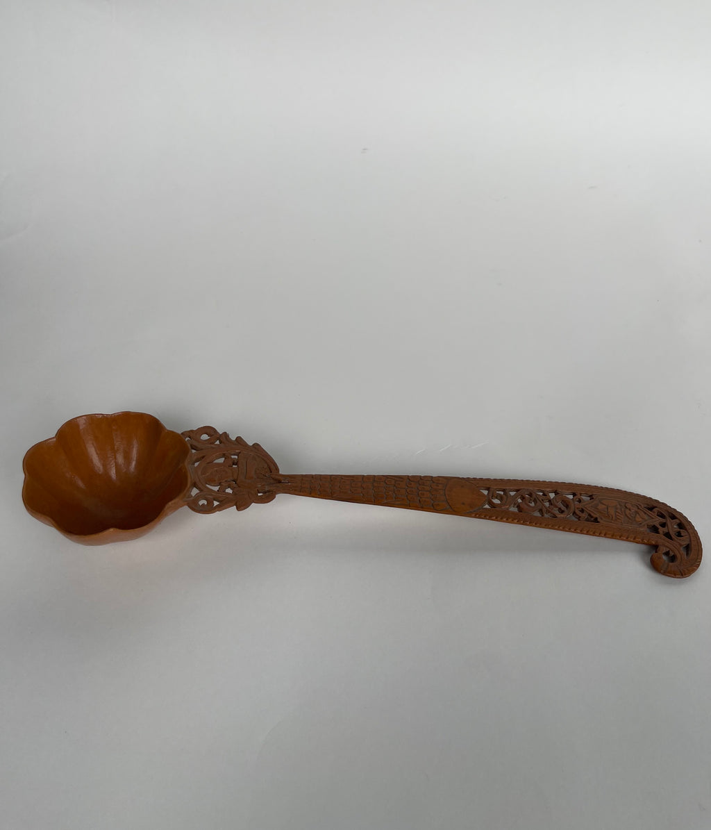 A Persian Qajar Hand Carved Wooden Sherbet Spoon. Circa 1880