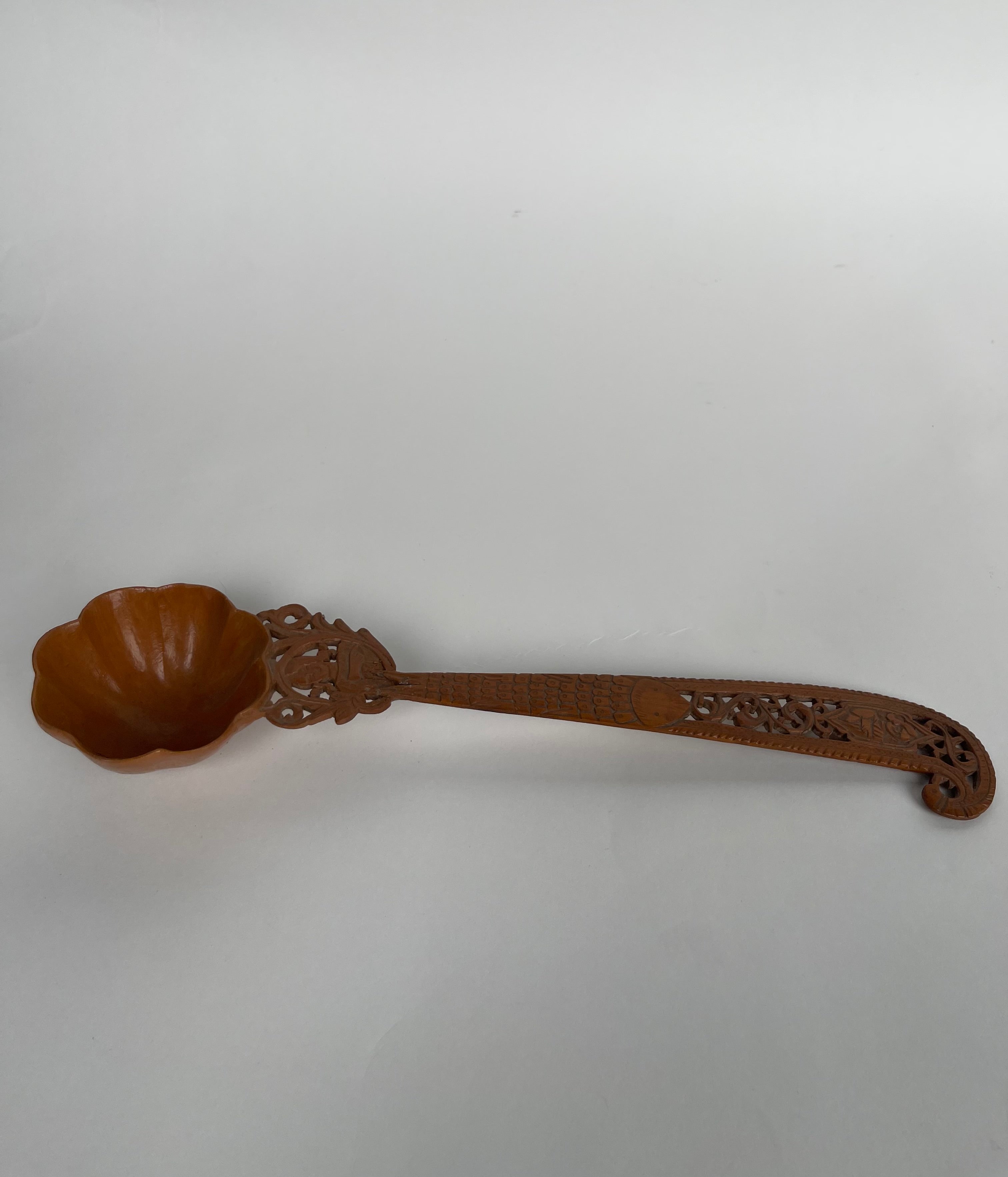 A Persian Qajar Hand Carved Wooden Sherbet Spoon. Circa 1880