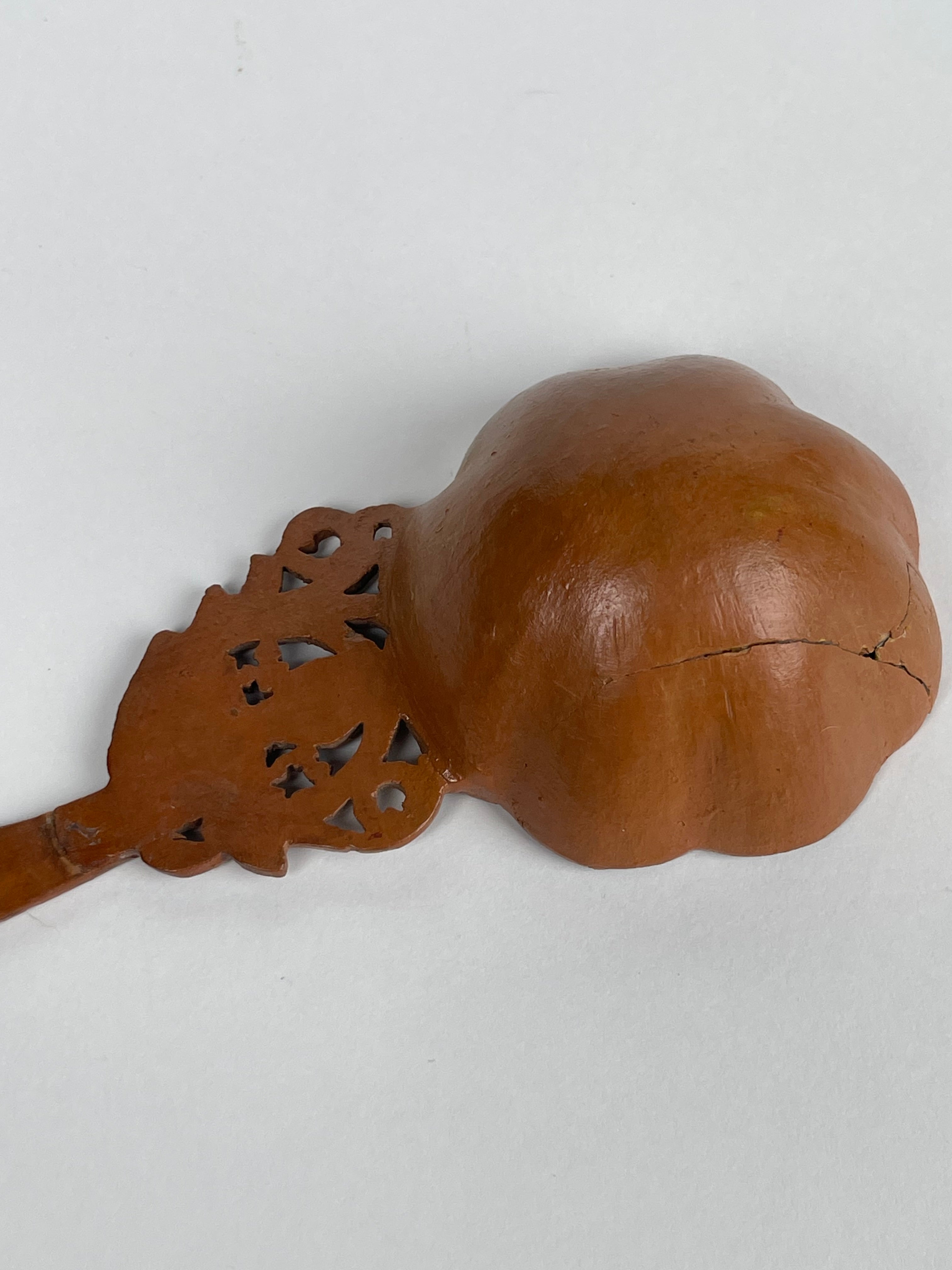 A Persian Qajar Hand Carved Wooden Sherbet Spoon. Circa 1880