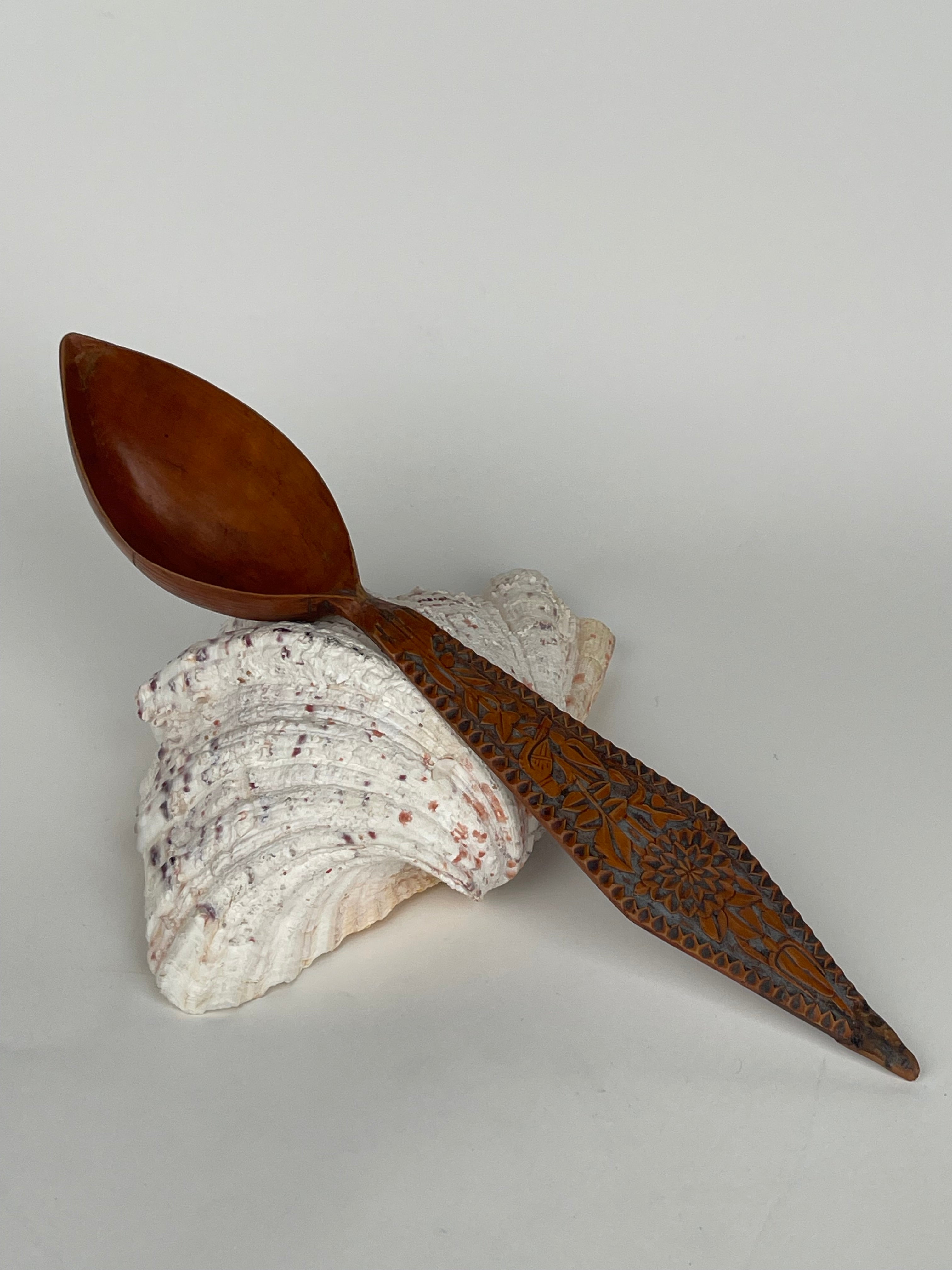 A Persian Qajar Hand Carved Wooden Sherbet Spoon. Circa 1880