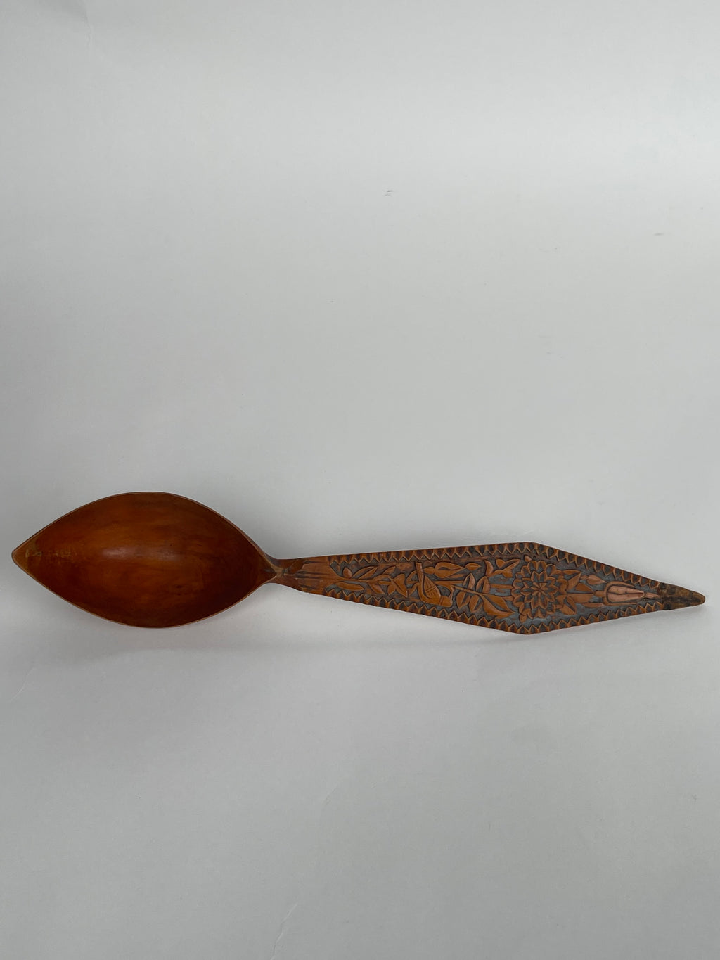 A Persian Qajar Hand Carved Wooden Sherbet Spoon. Circa 1880