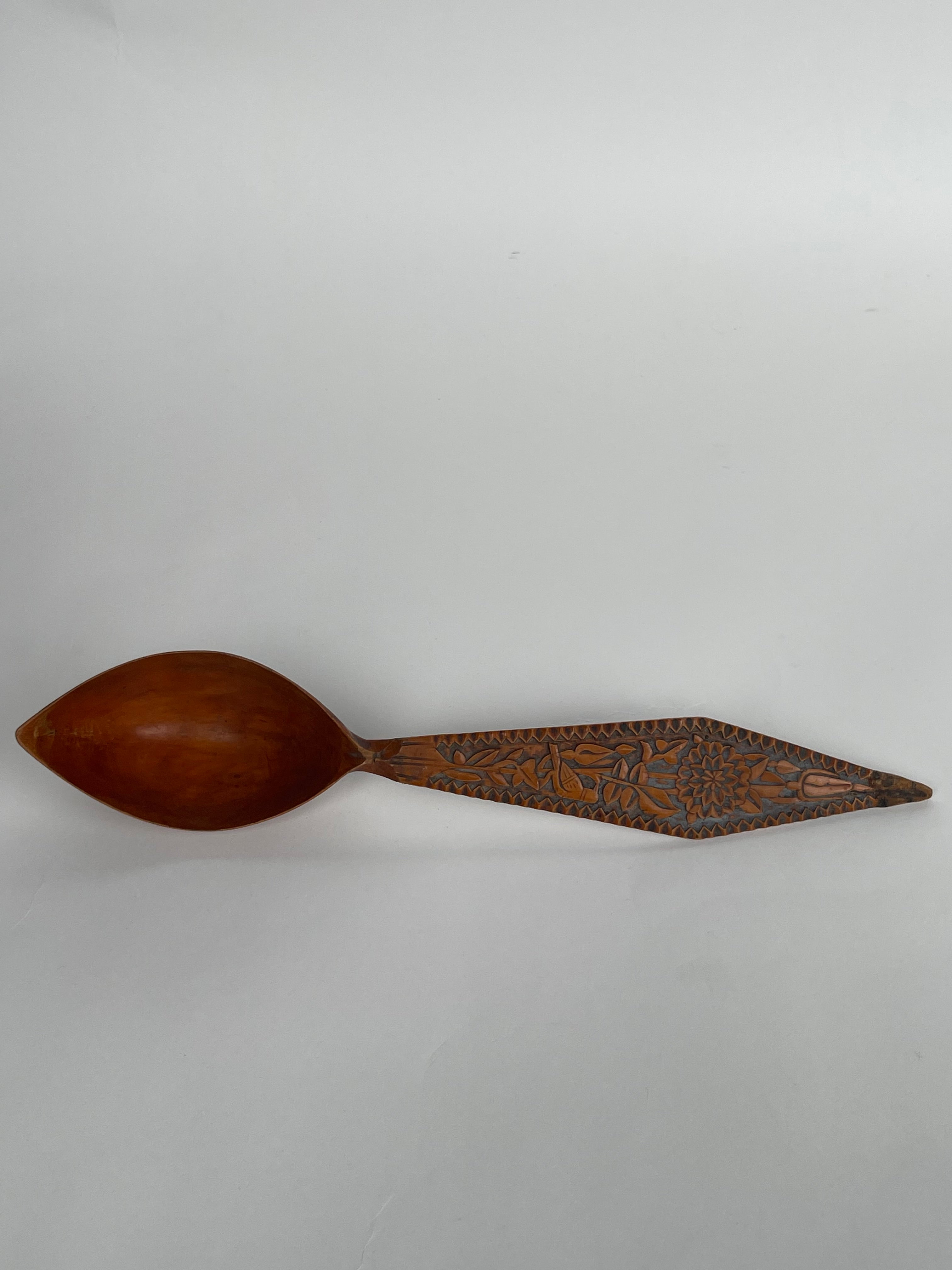 A Persian Qajar Hand Carved Wooden Sherbet Spoon. Circa 1880