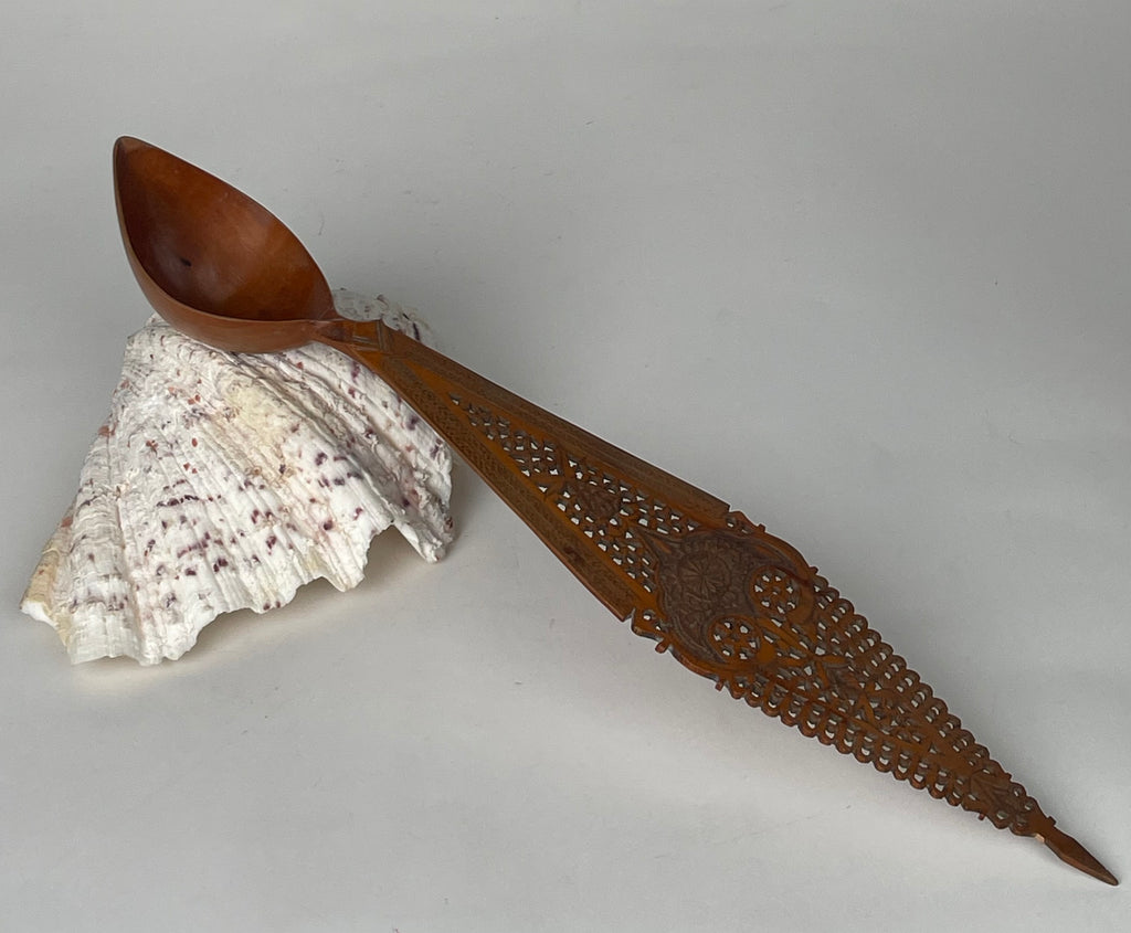 A Persian Qajar Hand Carved Wooden Sherbet Spoon. Circa 1880