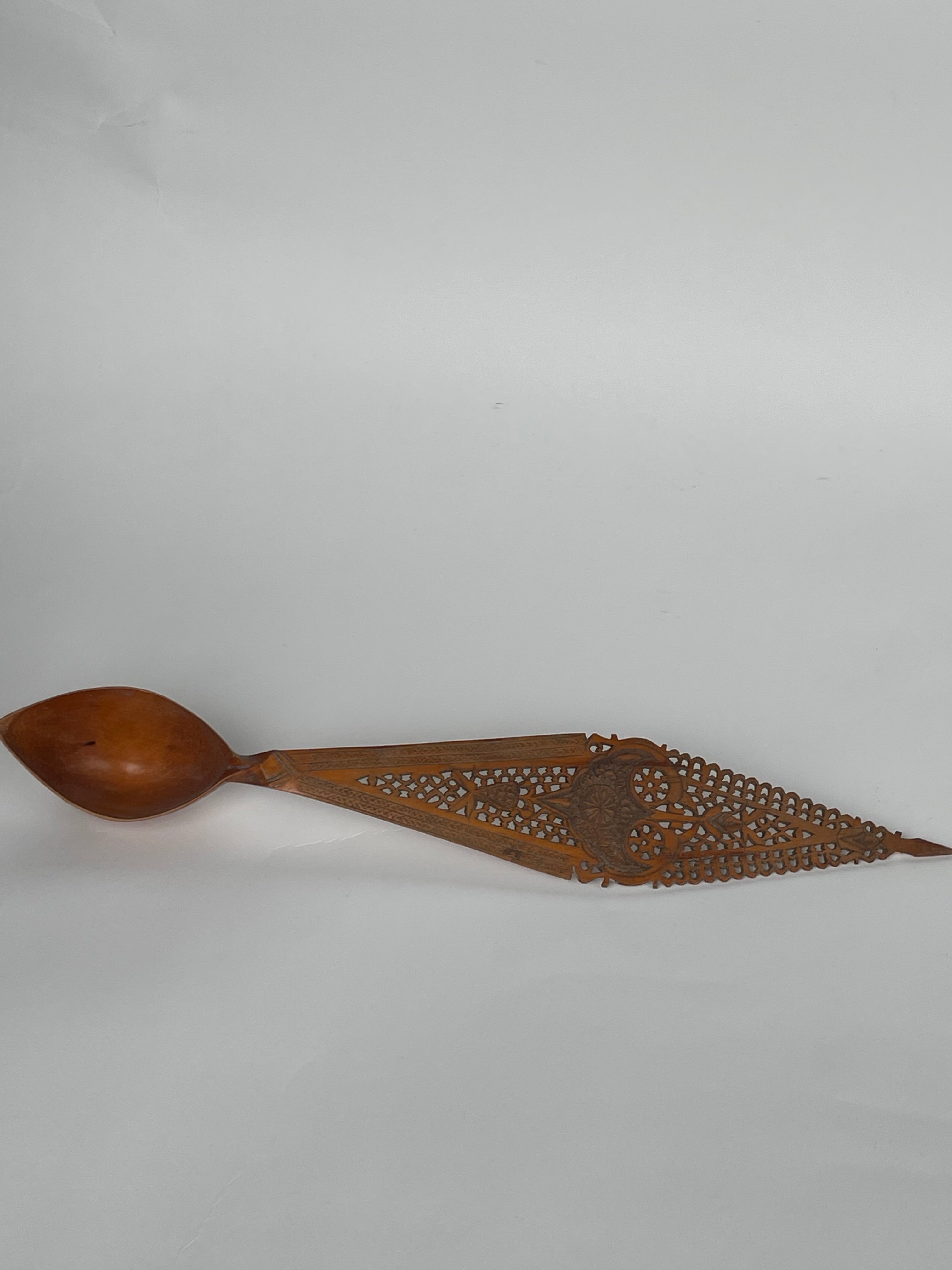 A Persian Qajar Hand Carved Wooden Sherbet Spoon. Circa 1880