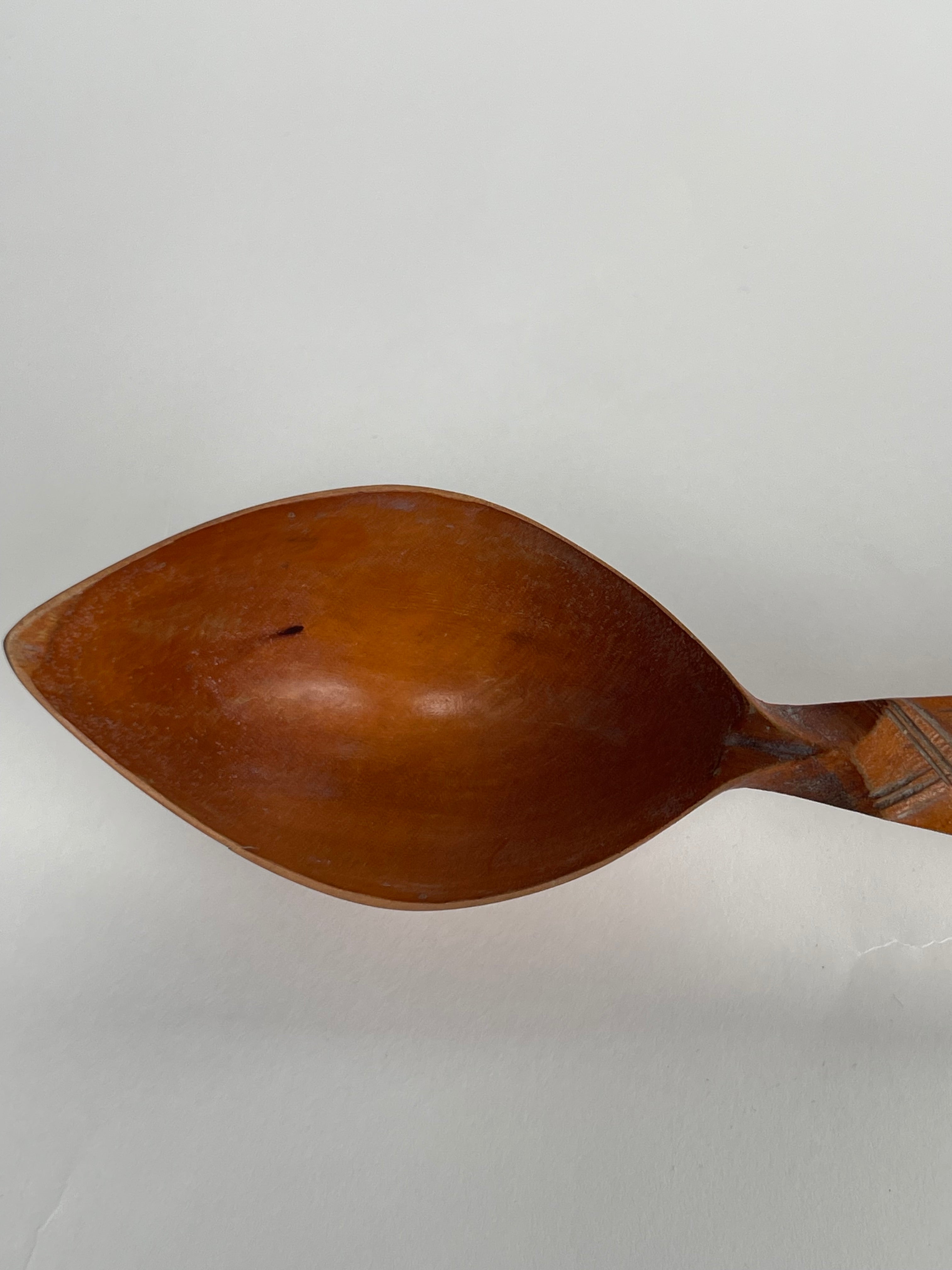 A Persian Qajar Hand Carved Wooden Sherbet Spoon. Circa 1880