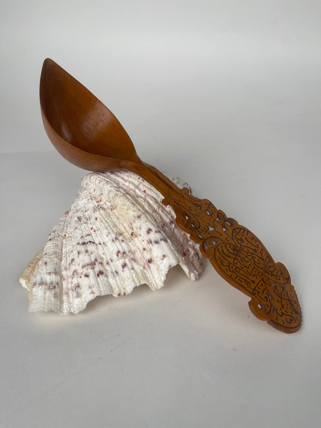 A Persian Qajar Hand Carved Wooden Sherbet Spoon. Circa 1880