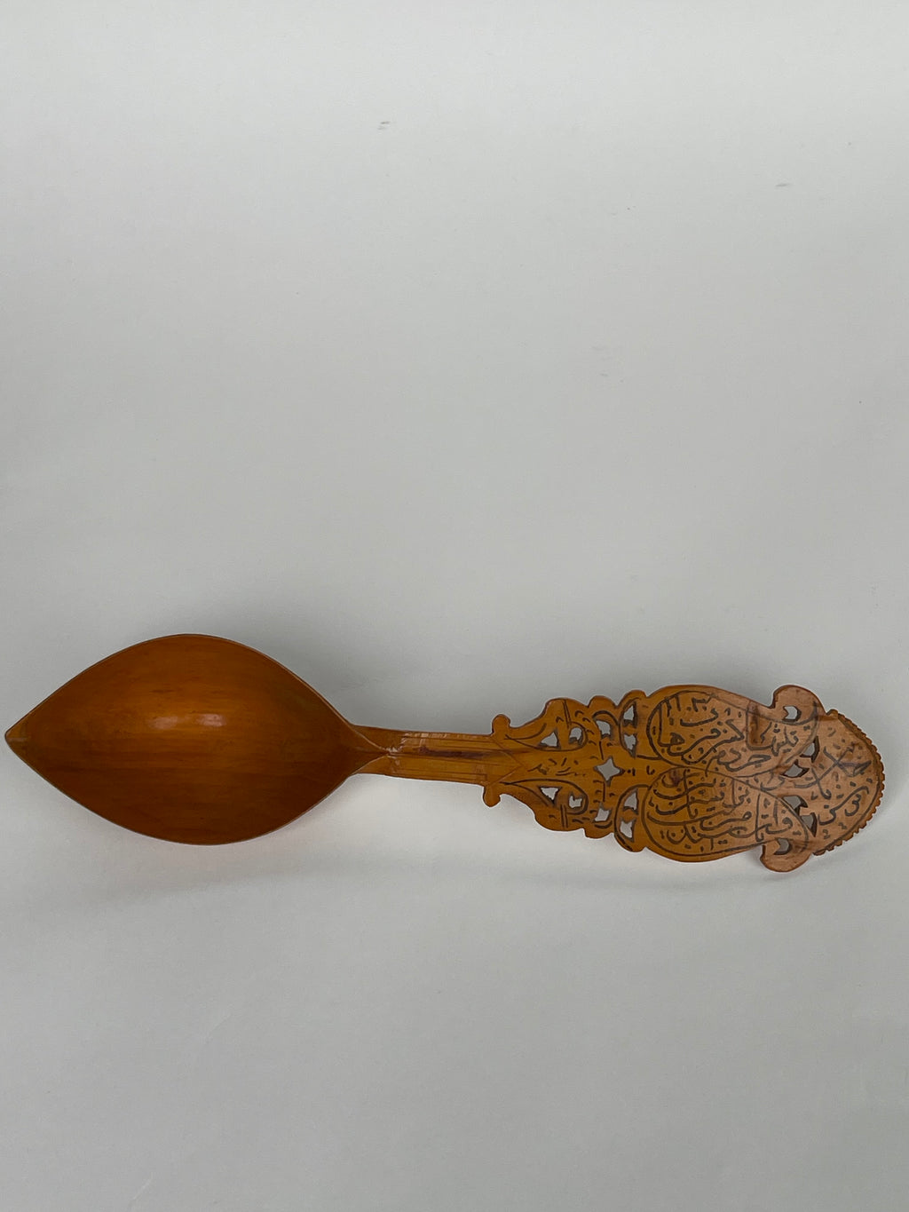 A Persian Qajar Hand Carved Wooden Sherbet Spoon. Circa 1880