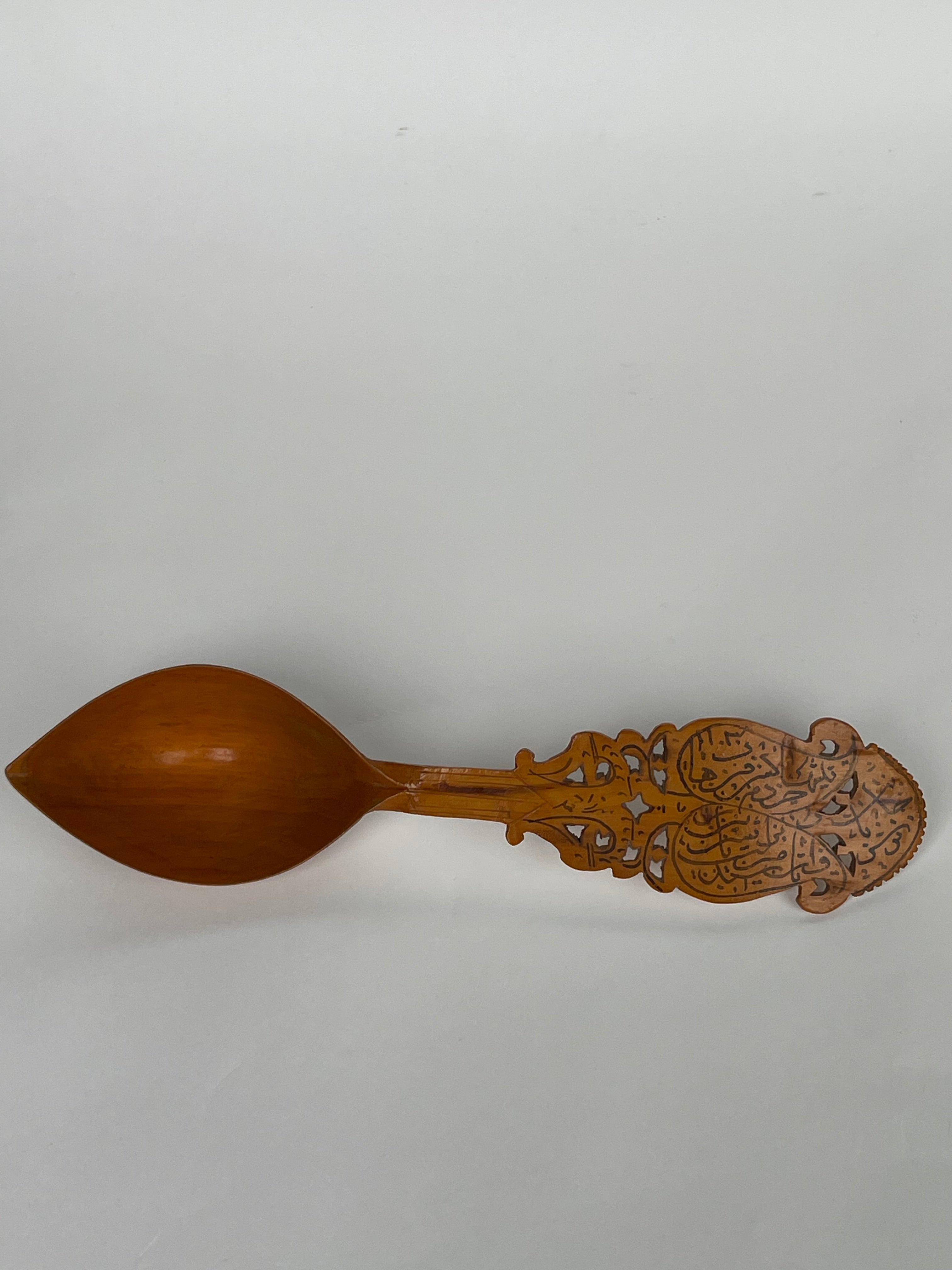 A Persian Qajar Hand Carved Wooden Sherbet Spoon. Circa 1880