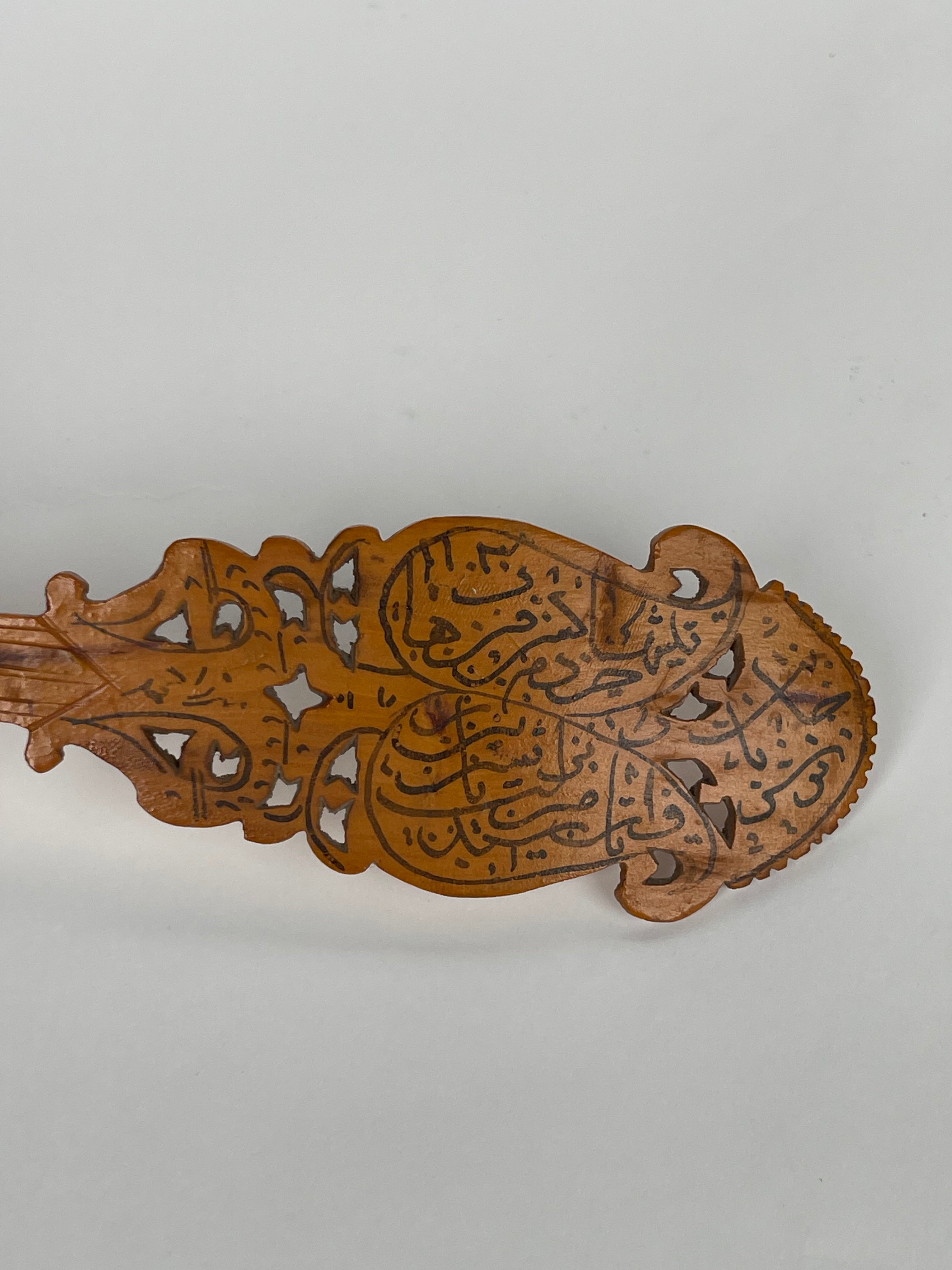 A Persian Qajar Hand Carved Wooden Sherbet Spoon. Circa 1880