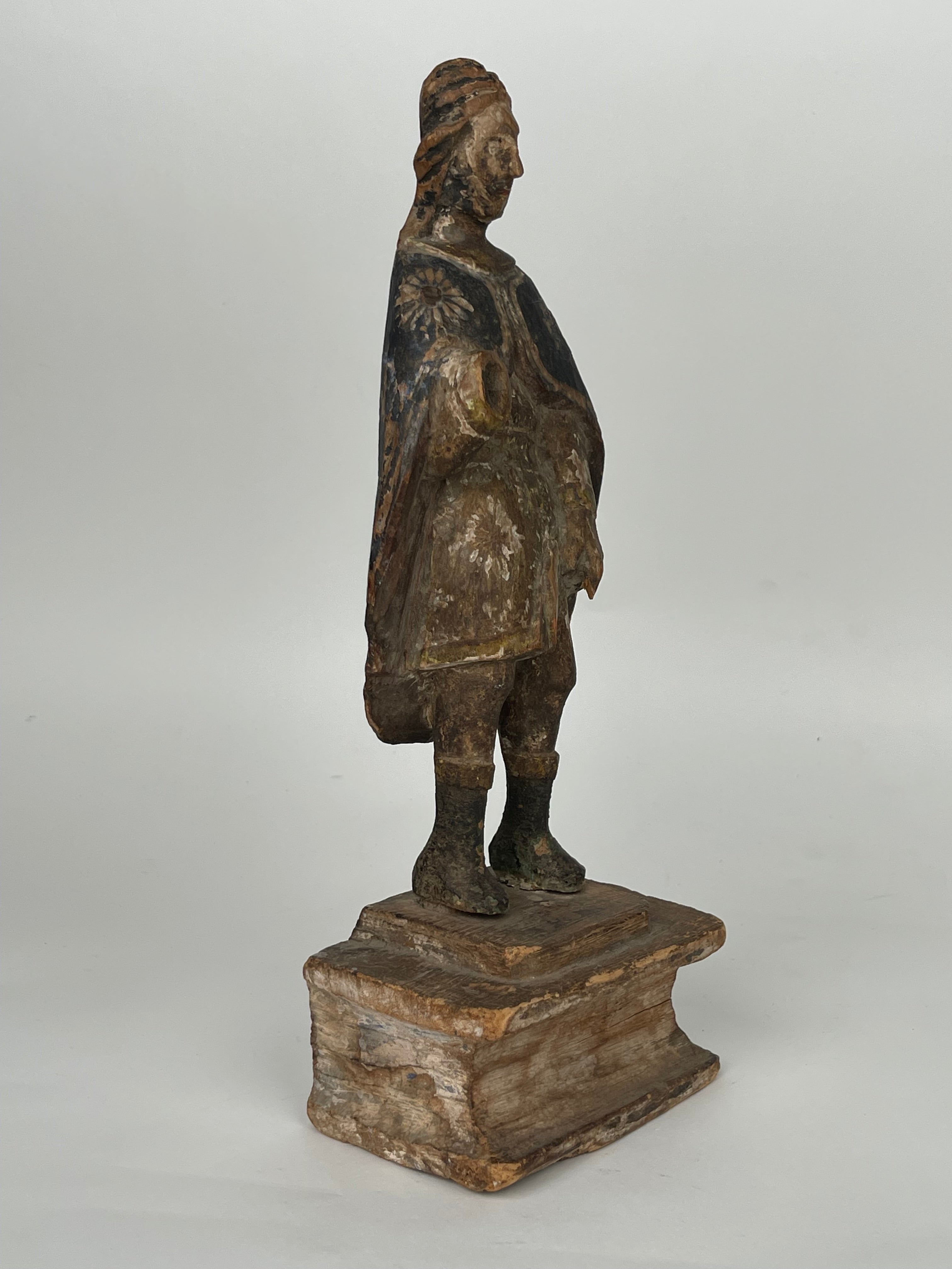 A 17th Century Italian Carved Wood Sculpture Of Saint Roque. Dated: 1675