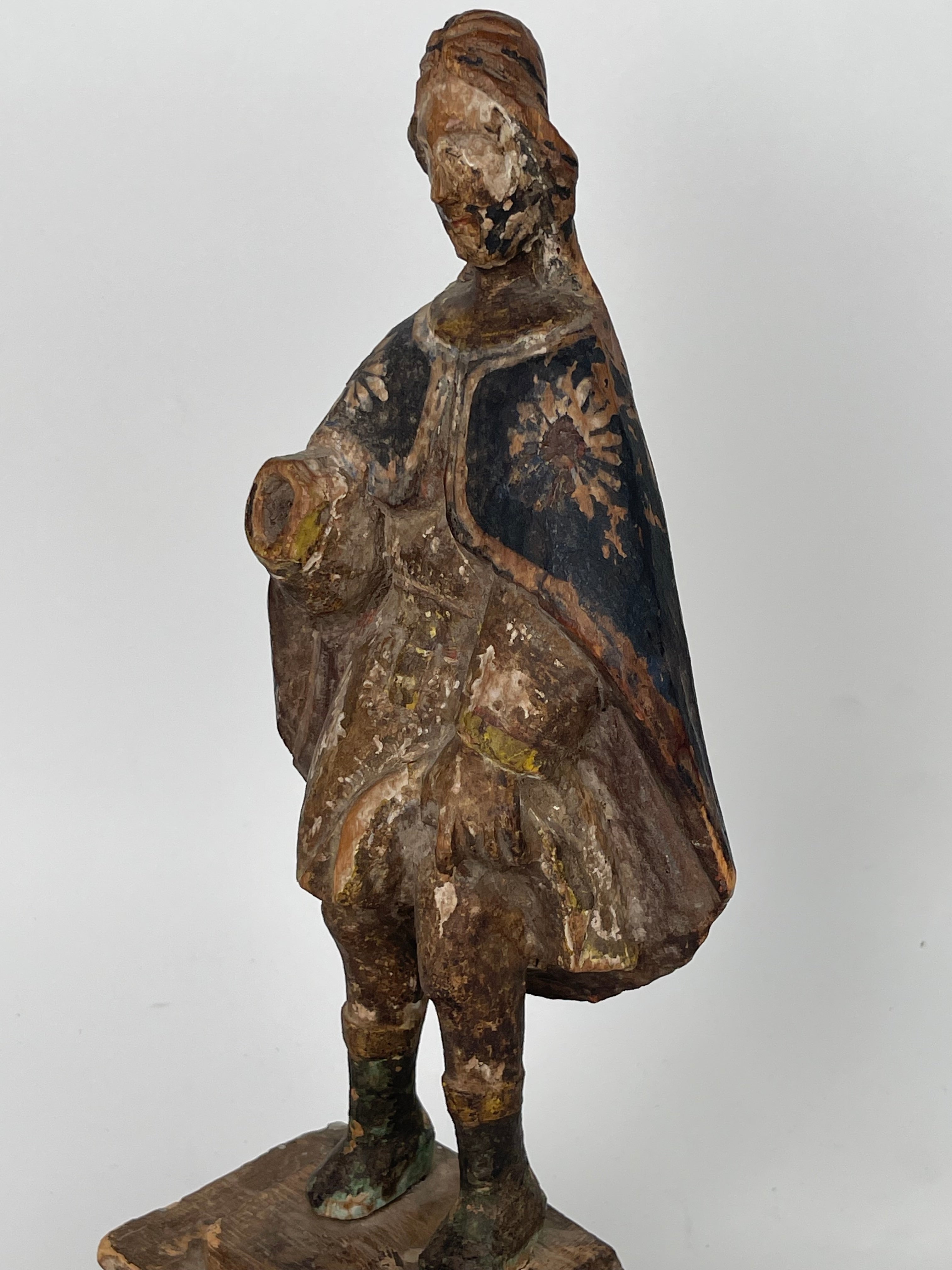 A 17th Century Italian Carved Wood Sculpture Of Saint Roque. Dated: 1675