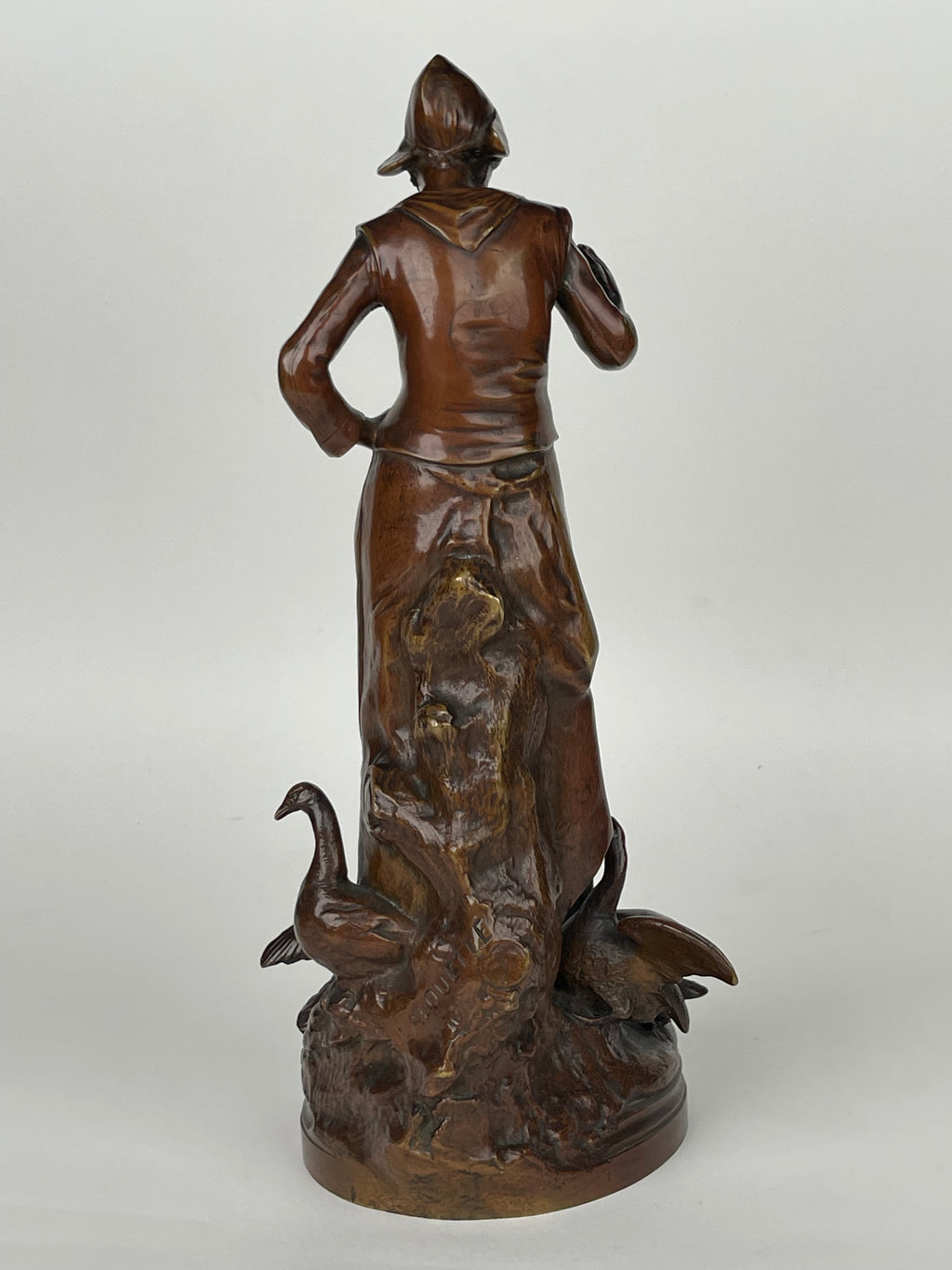 A Patinated Bronze Sculpture Of A Standing Lady Feeding Ducks By Lalouette