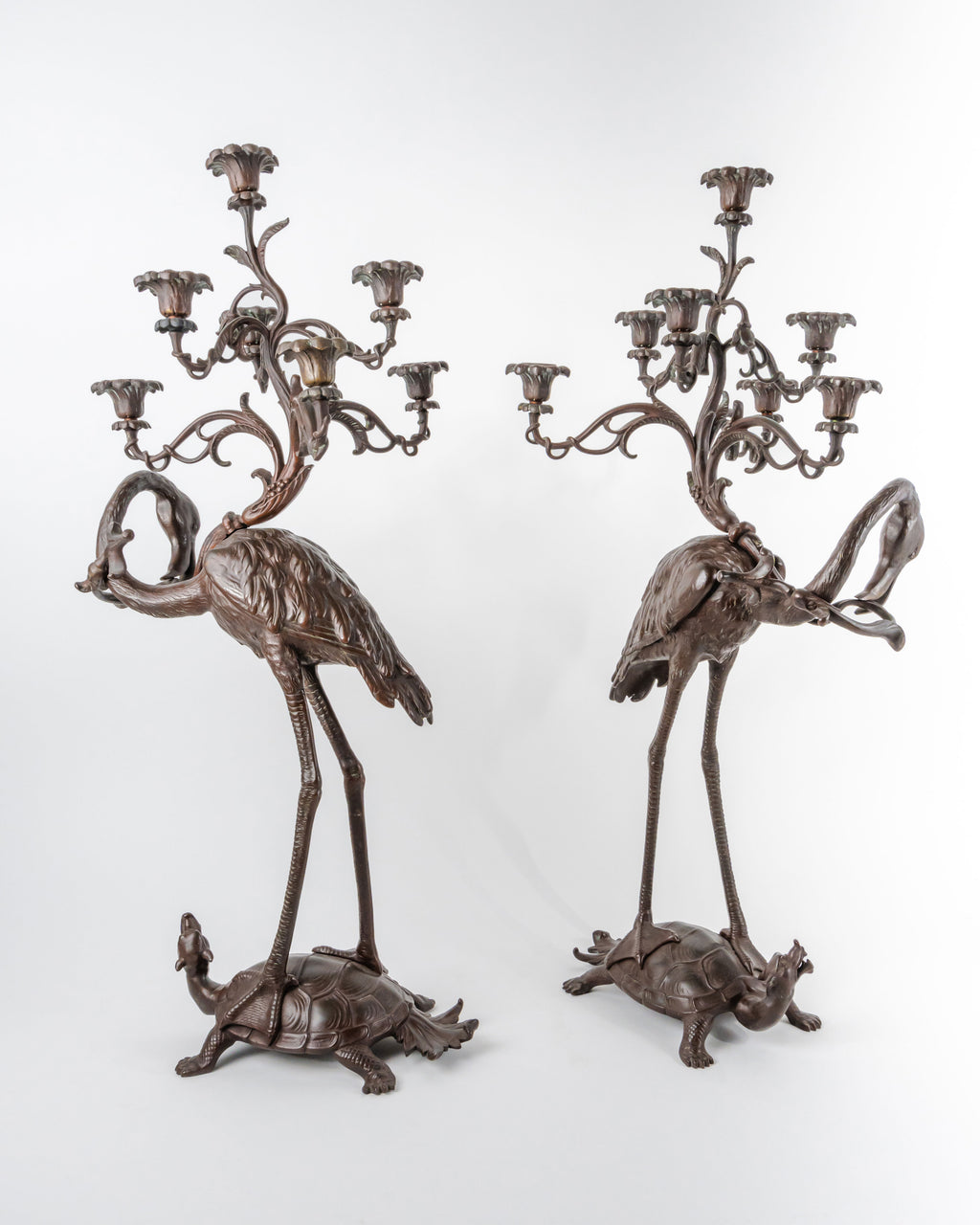 A Pair of French Japonaise Patinated Bronze Seven Light Candelabras