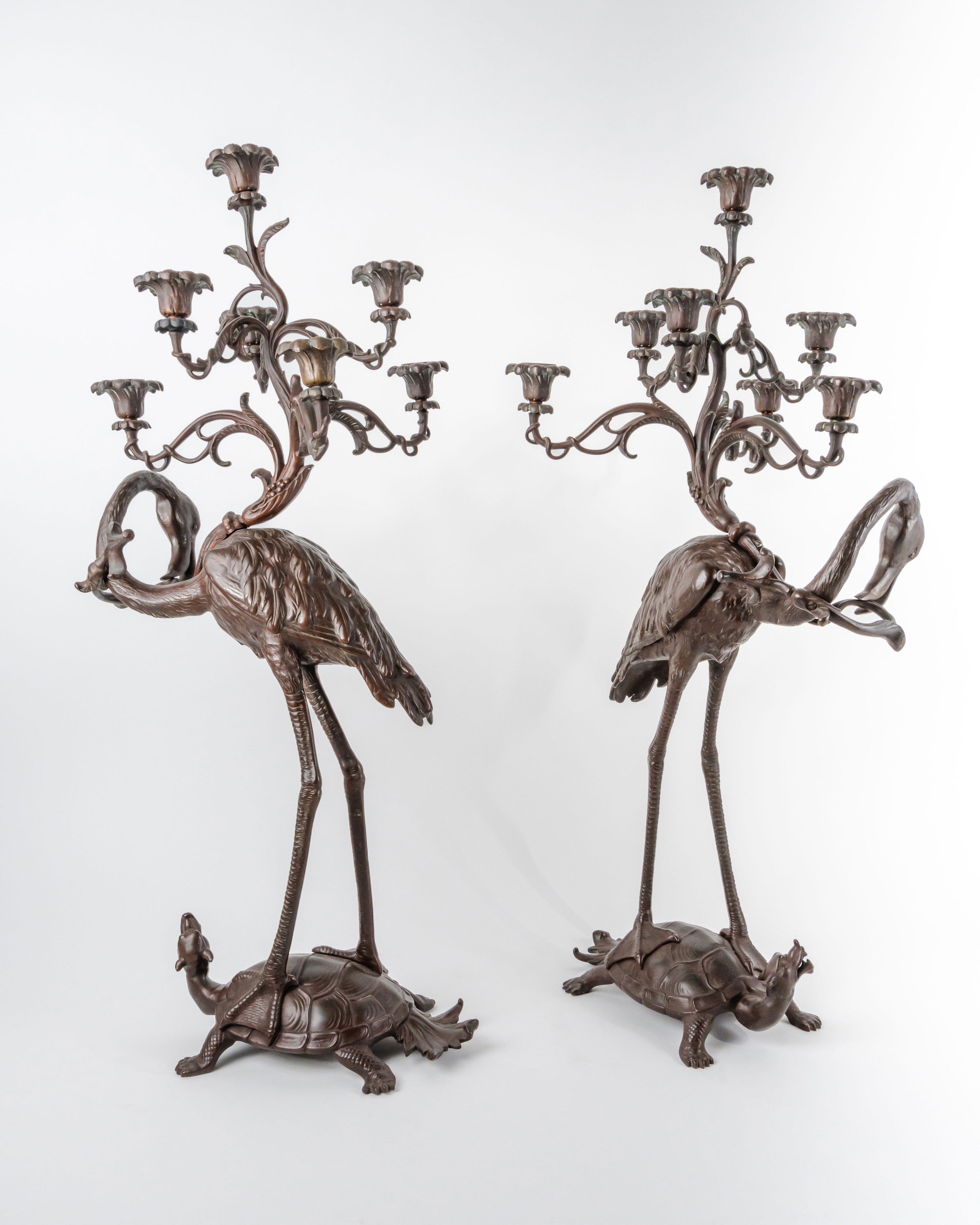 A Pair of French Japonaise Patinated Bronze Seven Light Candelabras
