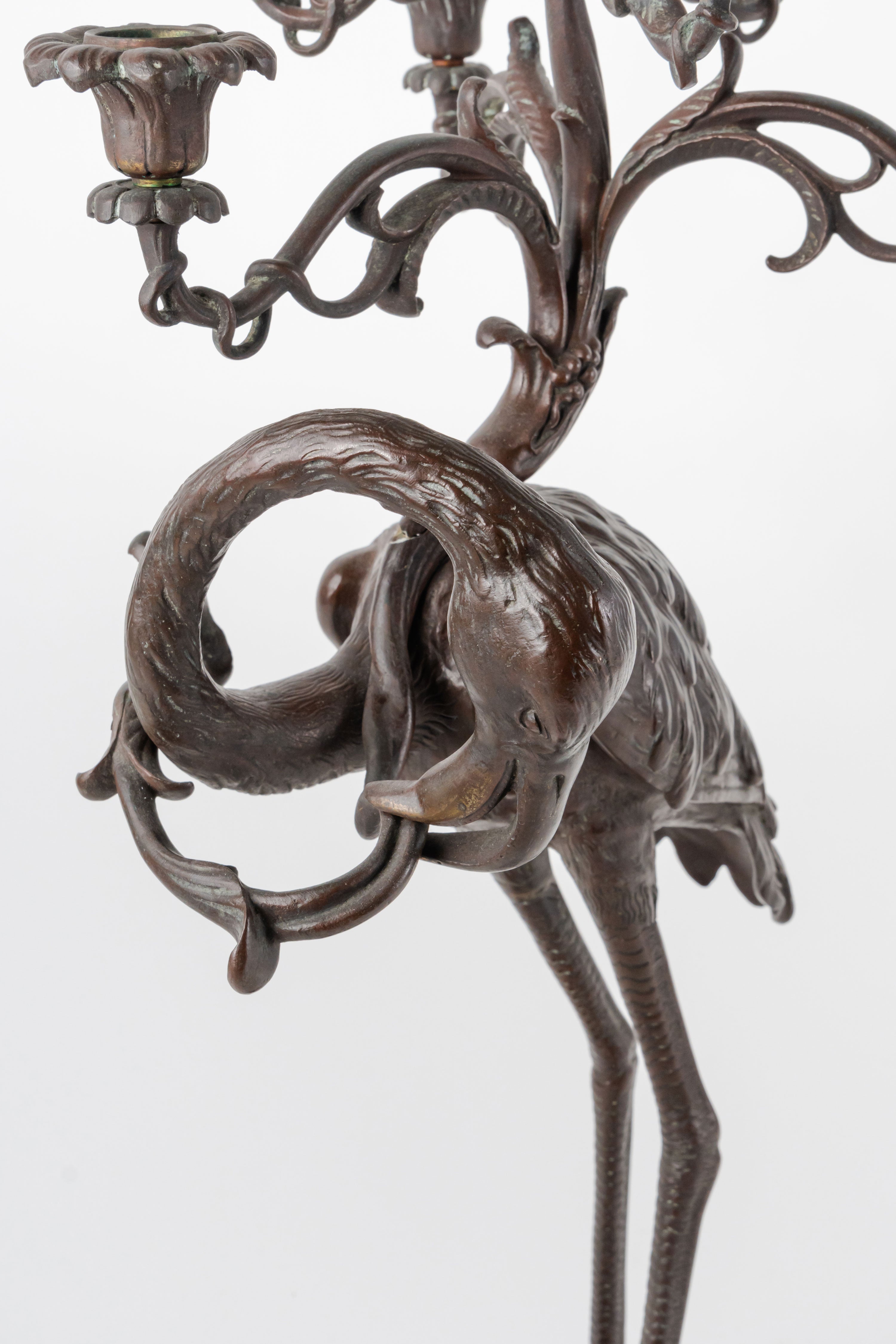 A Pair of French Japonaise Patinated Bronze Seven Light Candelabras