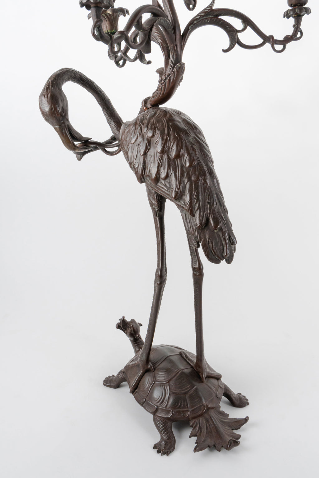 A Pair of French Japonaise Patinated Bronze Seven Light Candelabras