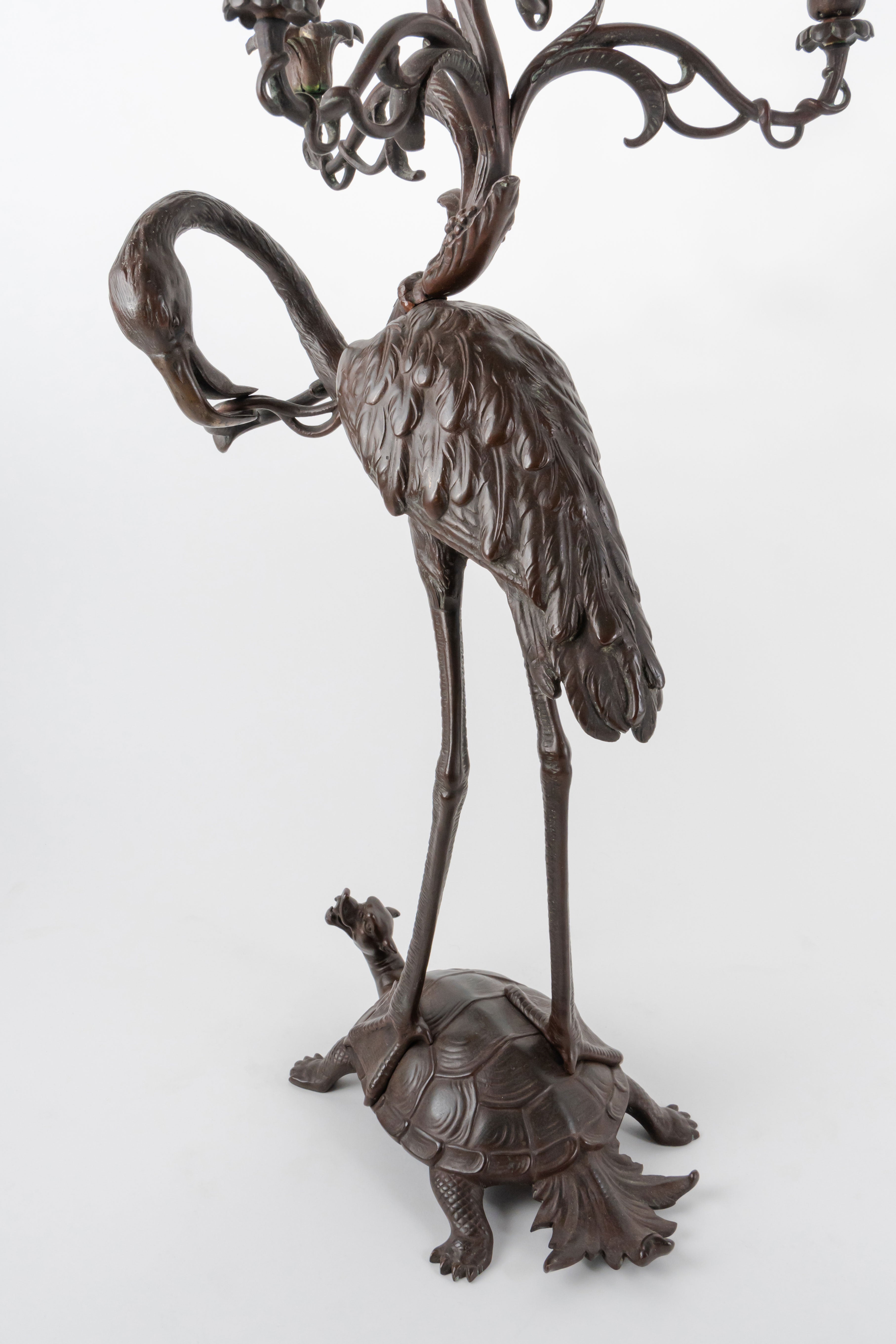 A Pair of French Japonaise Patinated Bronze Seven Light Candelabras