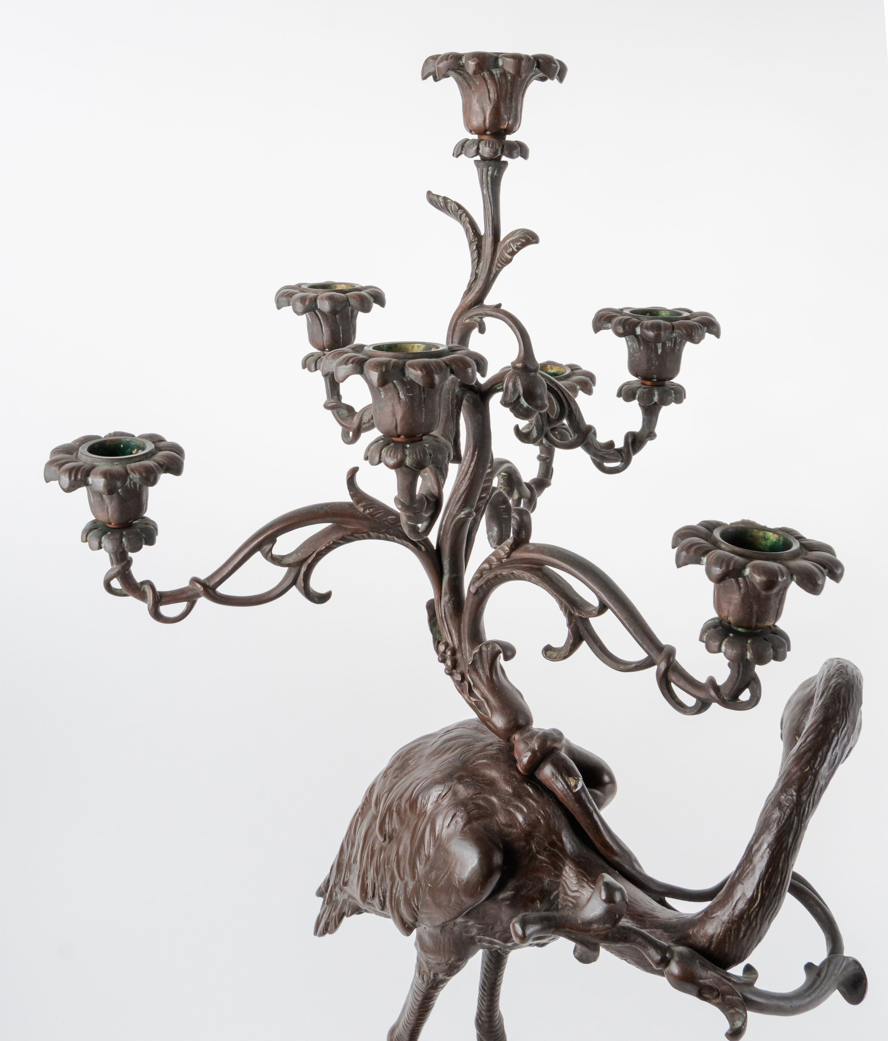A Pair of French Japonaise Patinated Bronze Seven Light Candelabras