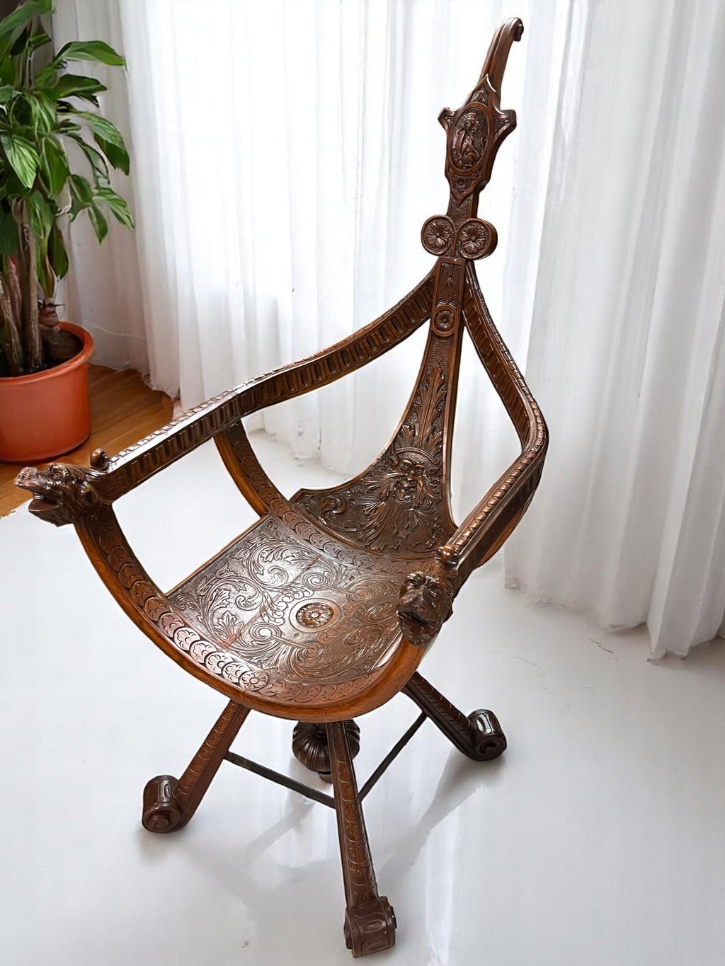 A 18th Century Italian Venetian Carved Walnut Gondola Chair