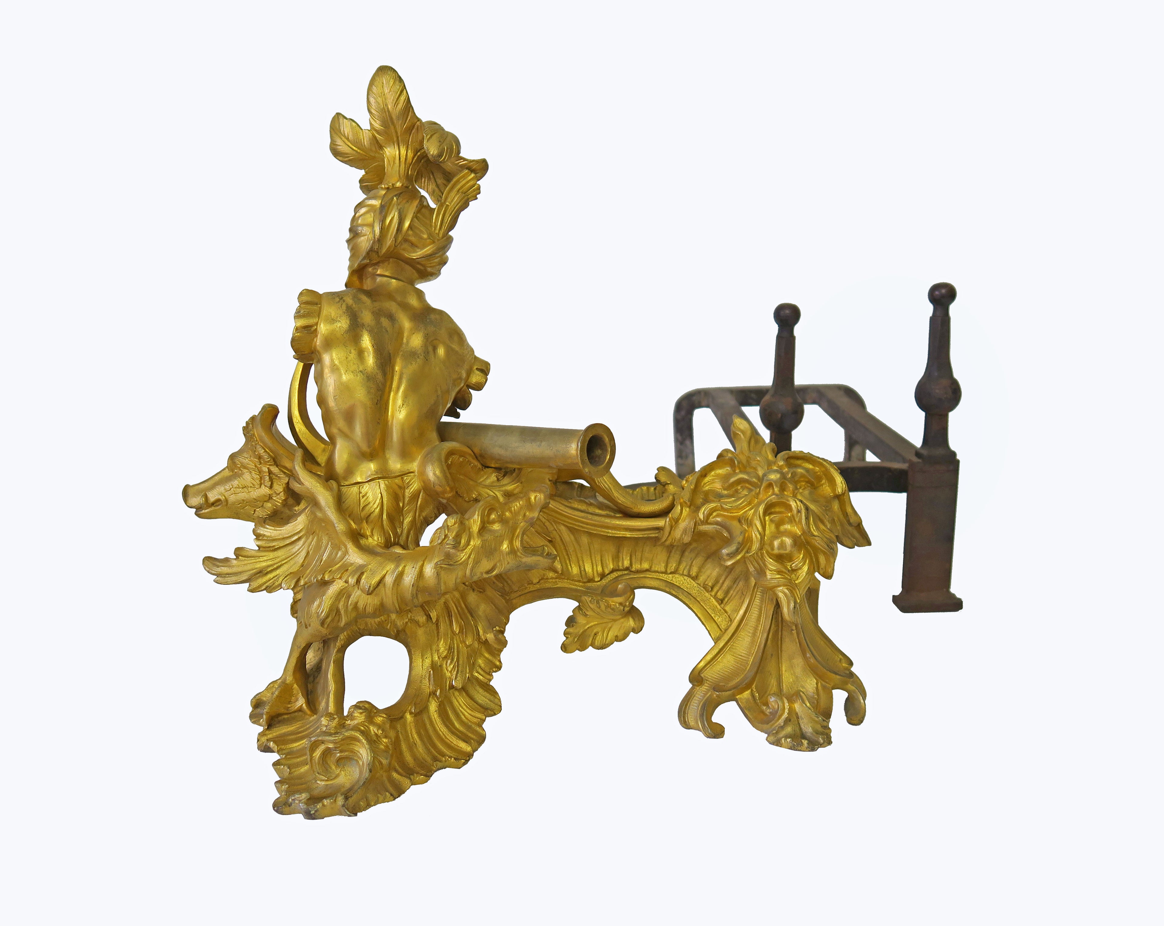 AN IMPORTANT PAIR OF FRENCH LOUIS XV ORMOLU CHENETS