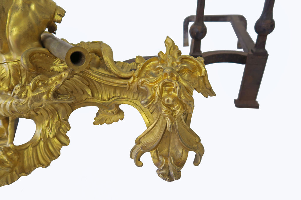 AN IMPORTANT PAIR OF FRENCH LOUIS XV ORMOLU CHENETS