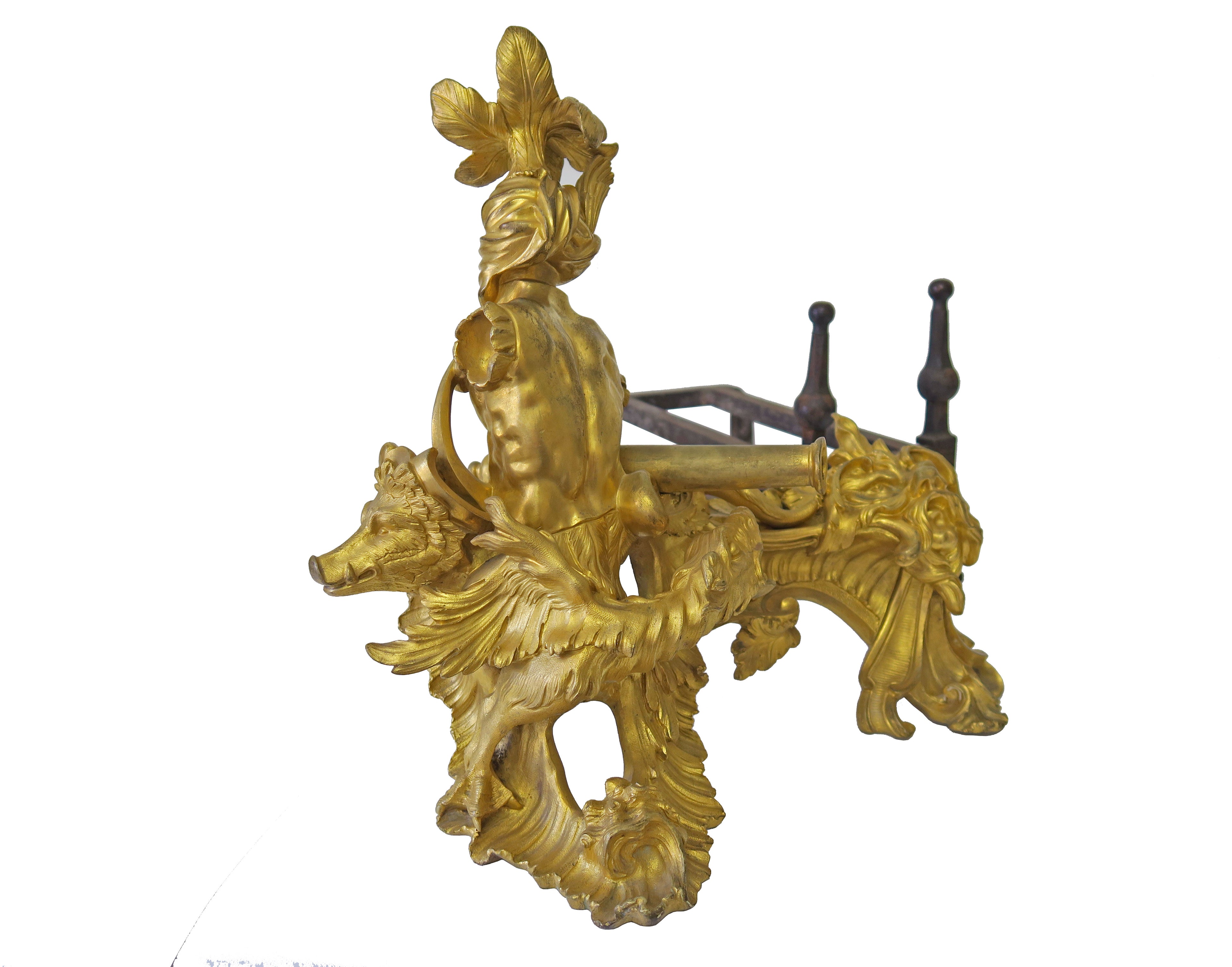 AN IMPORTANT PAIR OF FRENCH LOUIS XV ORMOLU CHENETS