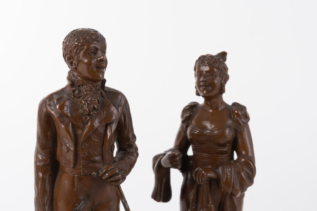 A Pair of Patinated Bronze Sculpture of a Couple