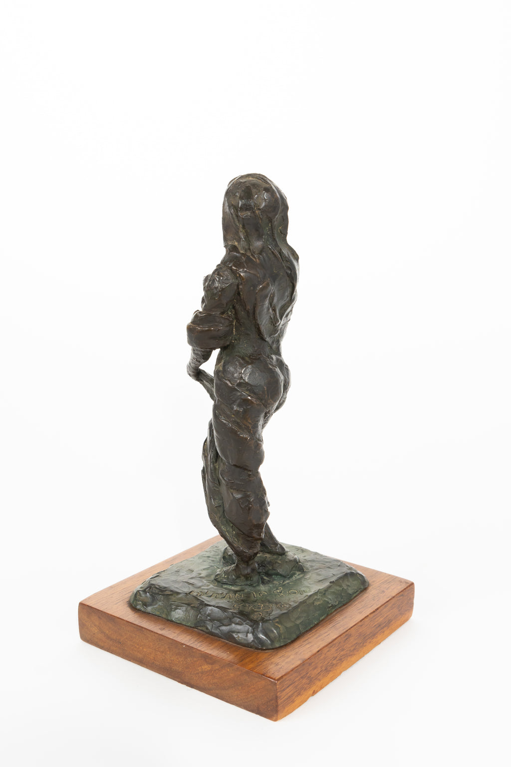 A Judaica Patinated Bronze Figure Of Lady Pointing on Holy Book
