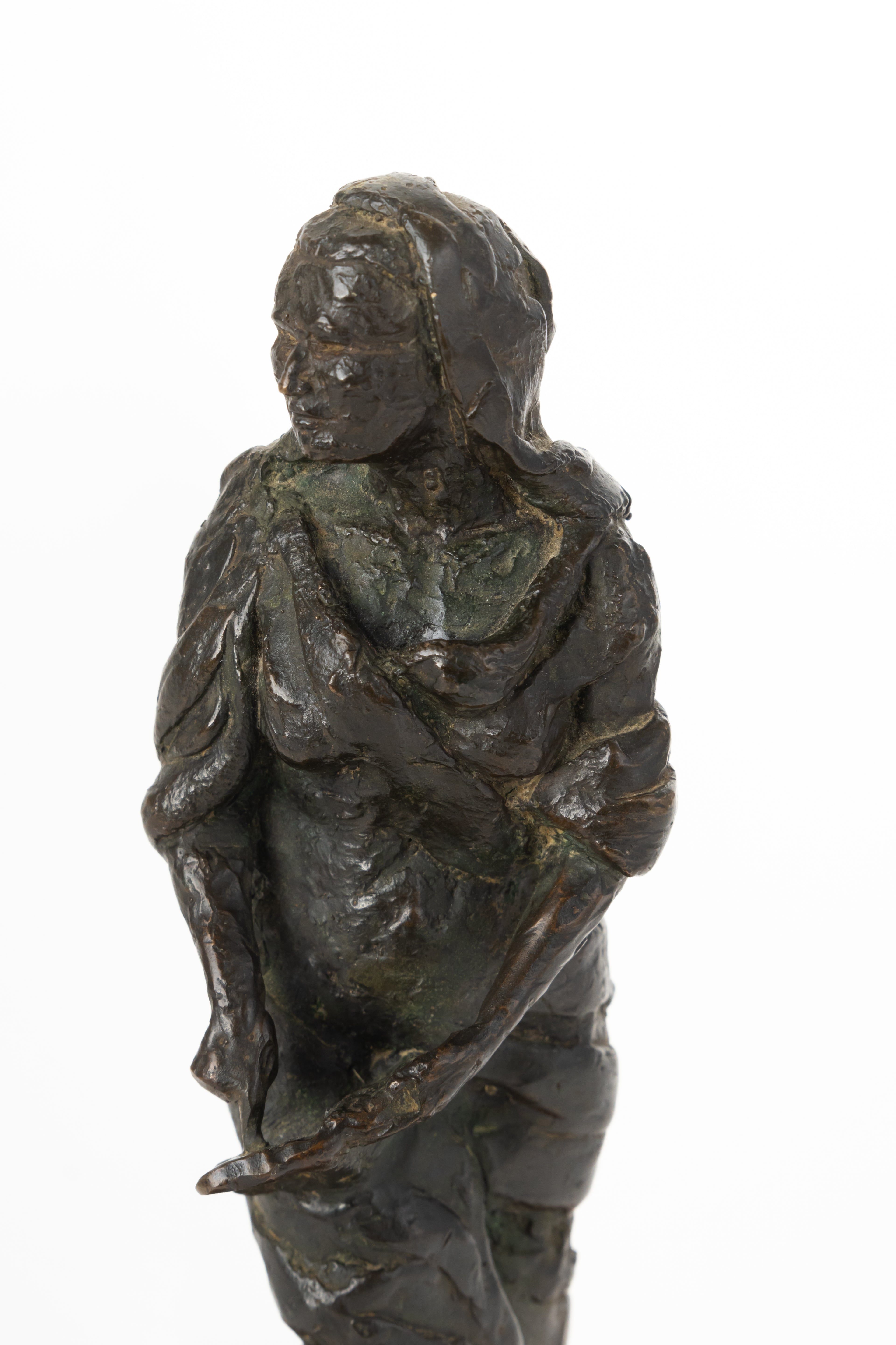 A Judaica Patinated Bronze Figure Of Lady Pointing on Holy Book